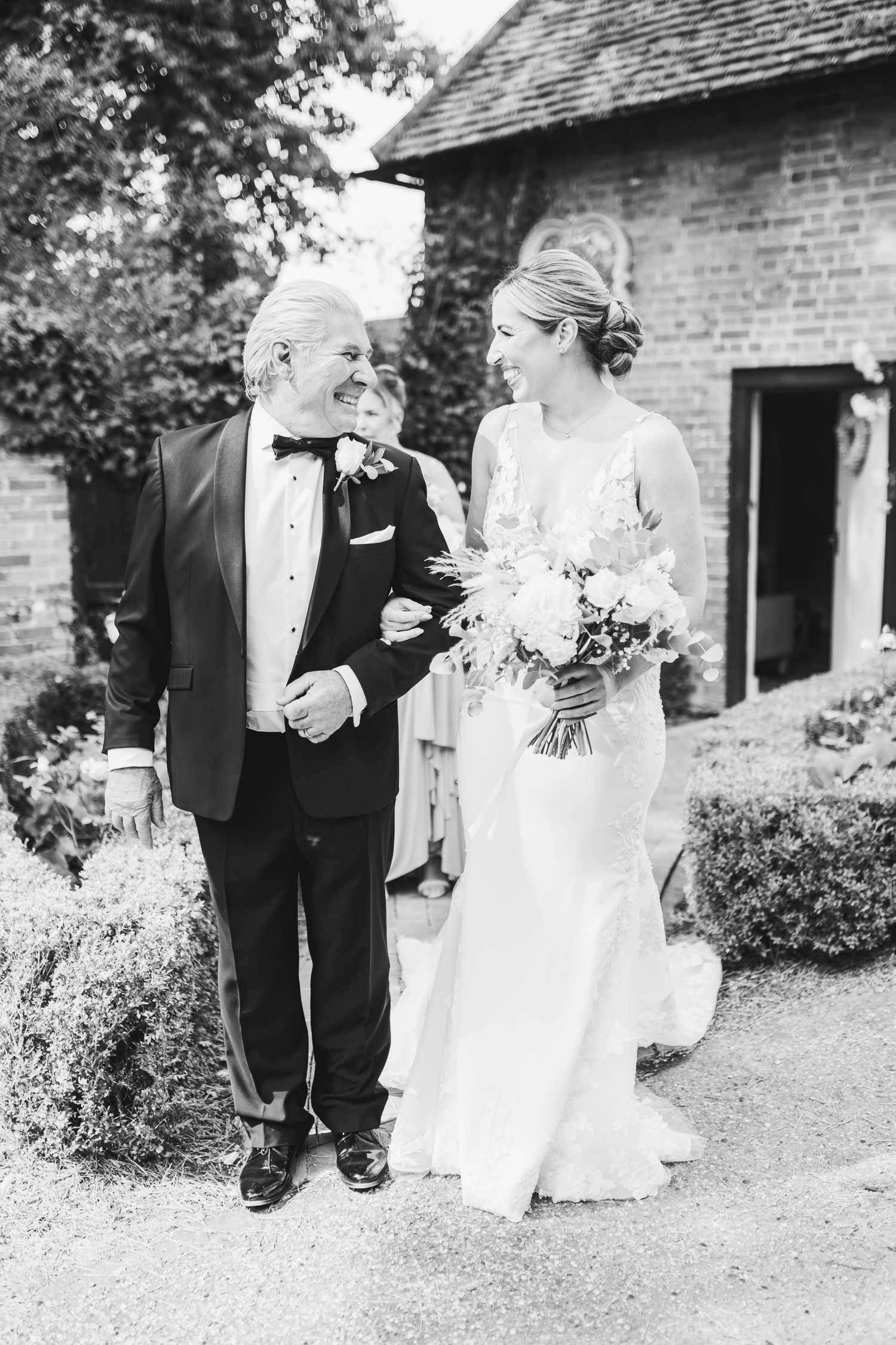 Beautiful wedding at Gaynes Park, Essex, featuring rustic barns, stunning gardens, and romantic outdoor photography in a picturesque setting