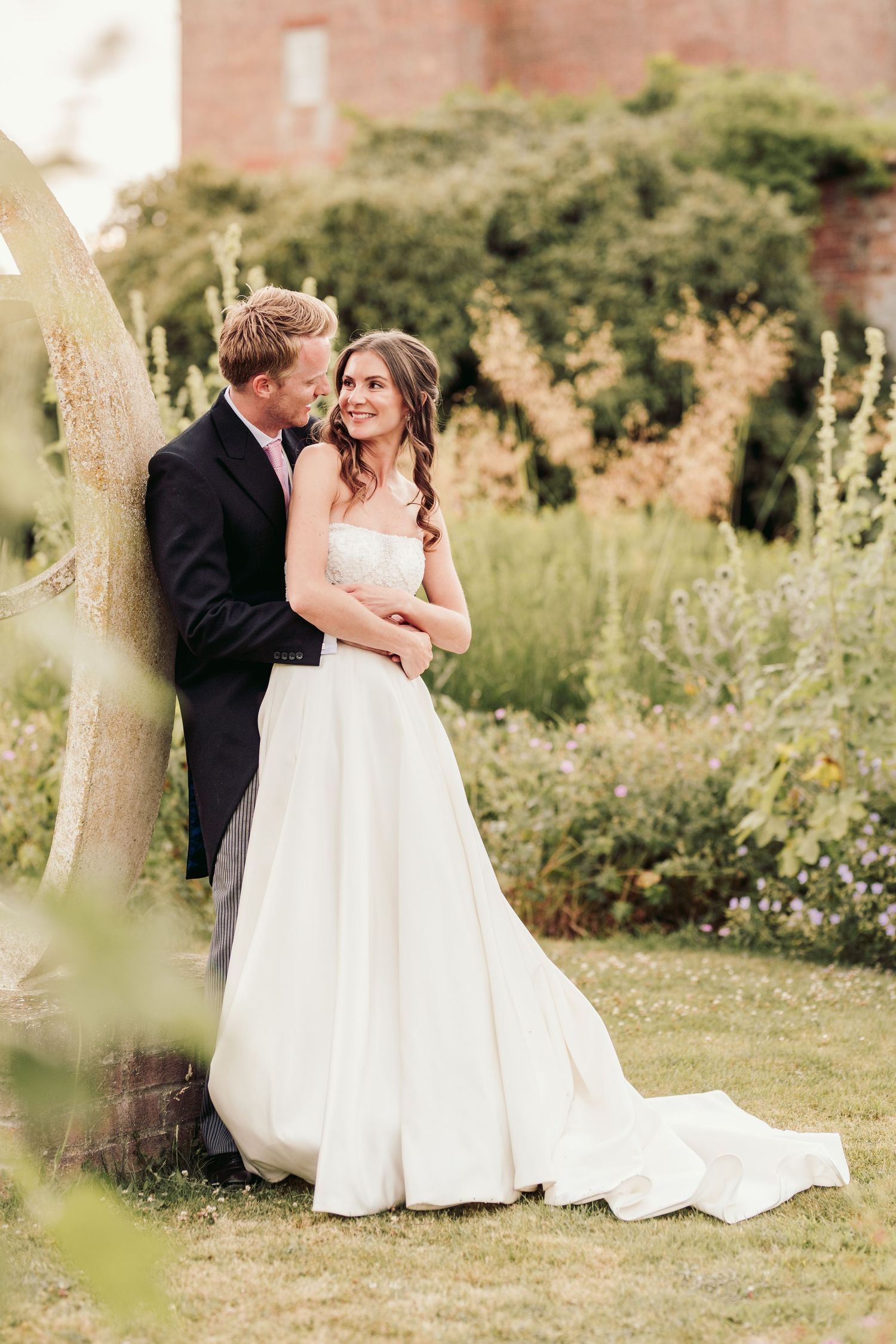 Glemham Hall Wedding Venue in Suffolk Countrysid Exchange Vows in Glemham Hall's Great HallTable Setup in Marquee with Pastel Flowers