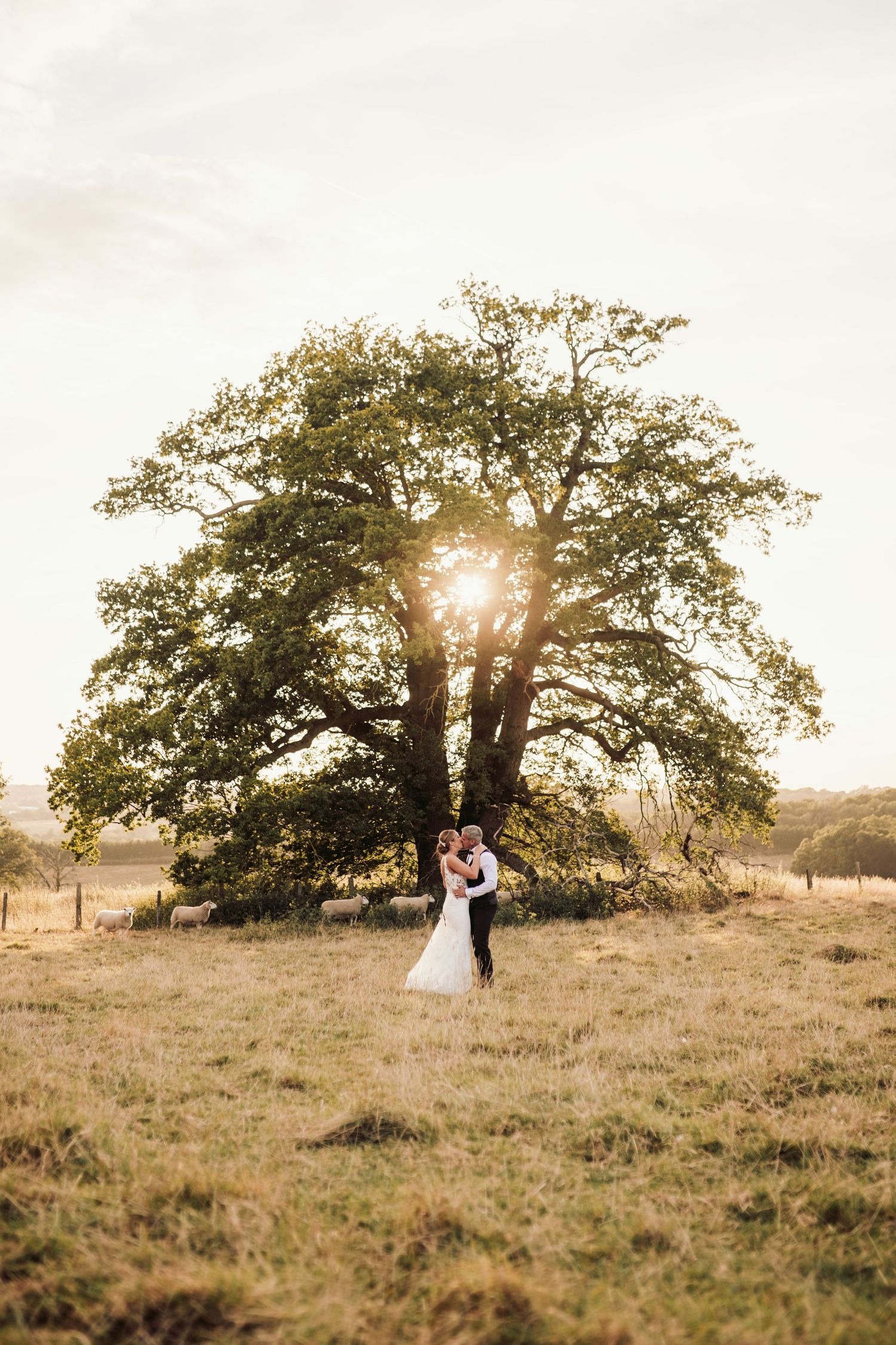 Beautiful wedding at Gaynes Park, Essex, featuring rustic barns, stunning gardens, and romantic outdoor photography in a picturesque setting