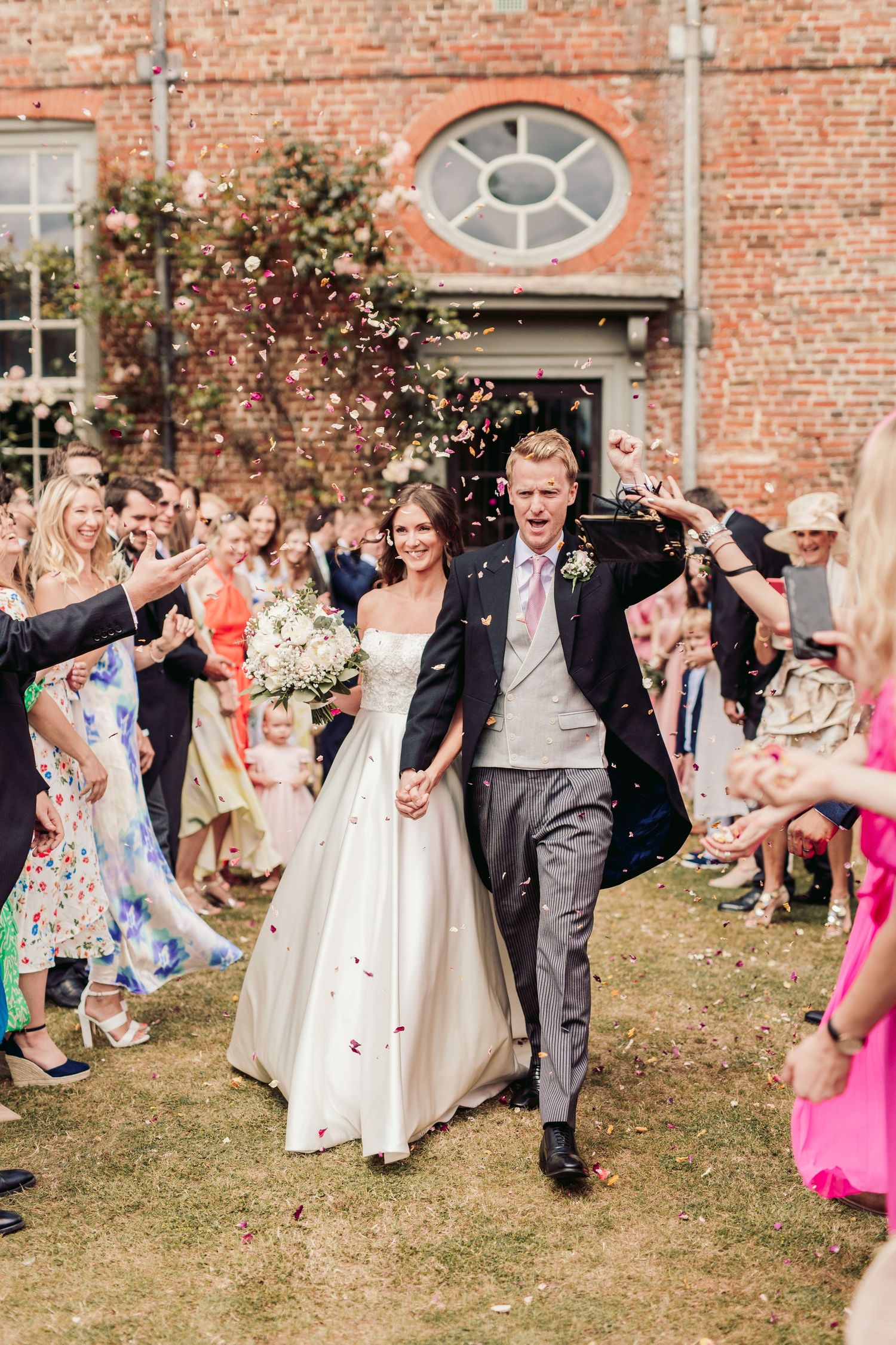 Glemham Hall Wedding Venue in Suffolk Countrysid Exchange Vows in Glemham Hall's Great HallTable Setup in Marquee with Pastel Flowers