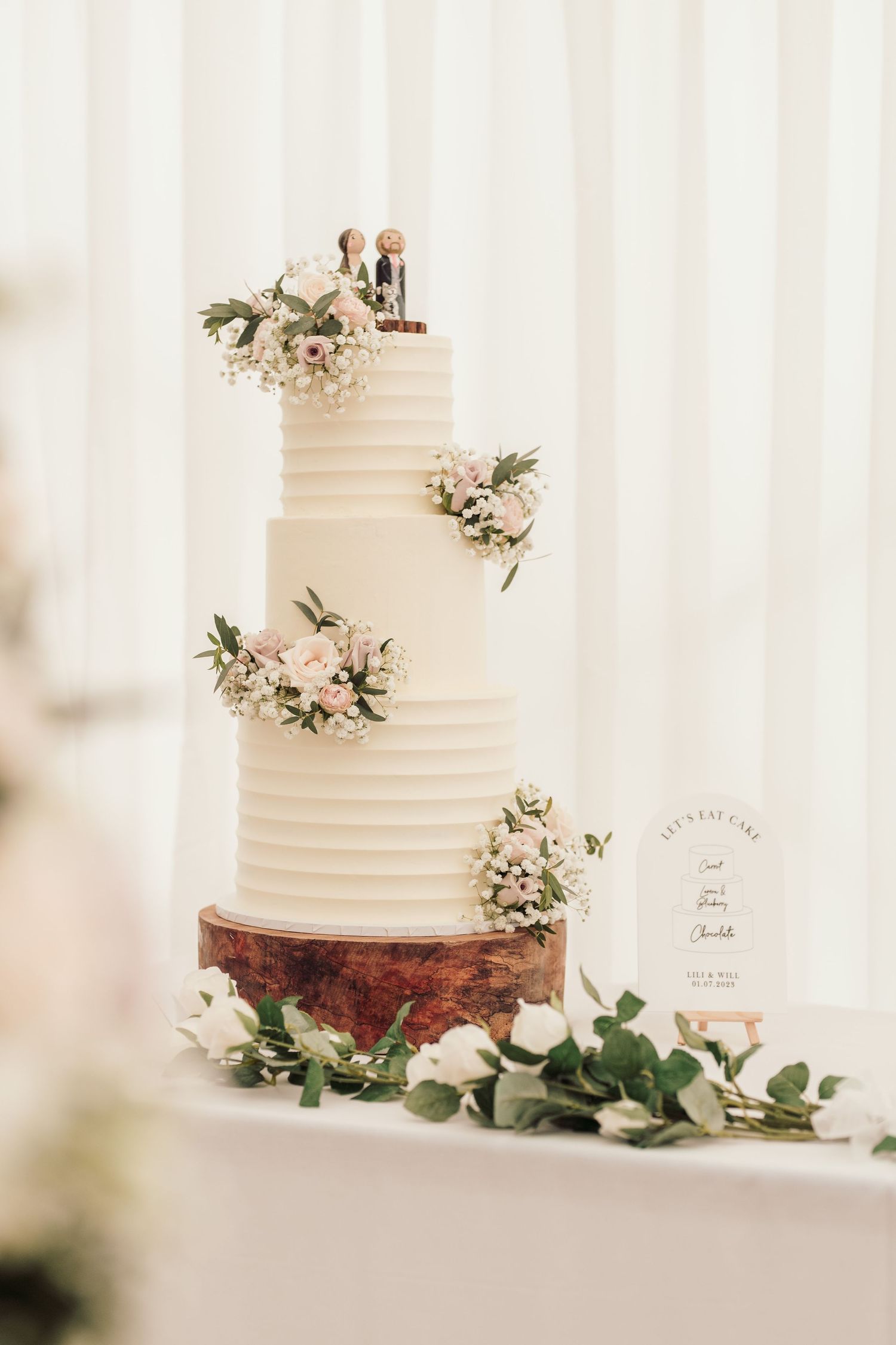 Glemham Hall Wedding Venue in Suffolk Countrysid Exchange Vows in Glemham Hall's Great HallTable Setup in Marquee with Pastel Flowers