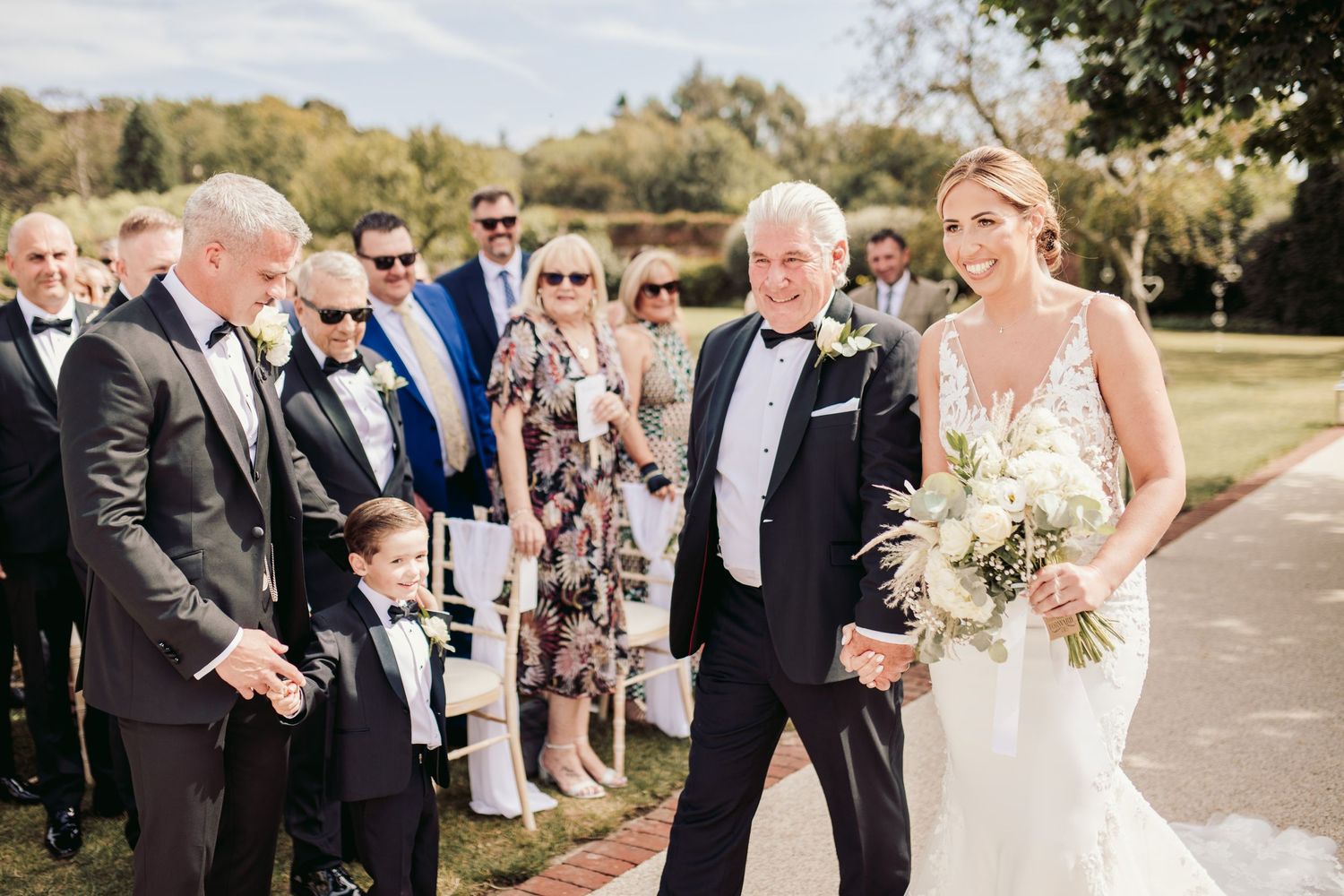 Beautiful wedding at Gaynes Park, Essex, featuring rustic barns, stunning gardens, and romantic outdoor photography in a picturesque setting