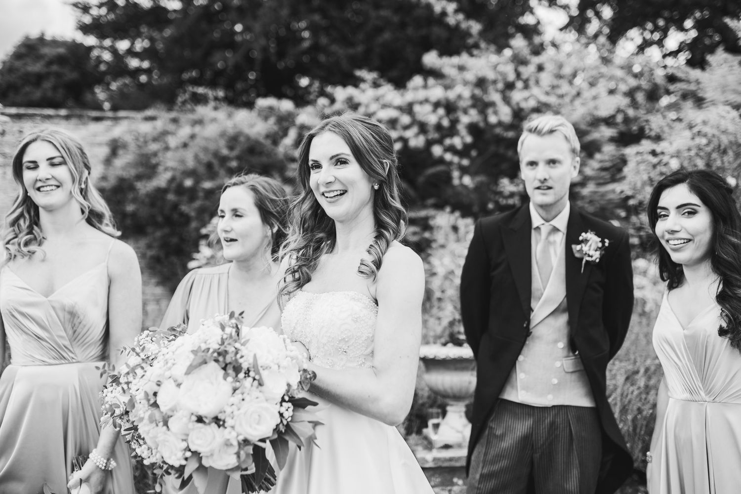 Glemham Hall Wedding Venue in Suffolk Countrysid Exchange Vows in Glemham Hall's Great HallTable Setup in Marquee with Pastel Flowers