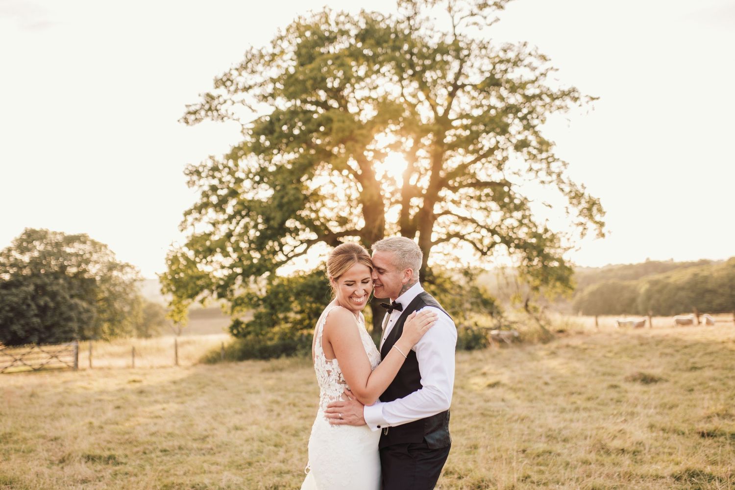 Beautiful wedding at Gaynes Park, Essex, featuring rustic barns, stunning gardens, and romantic outdoor photography in a picturesque setting