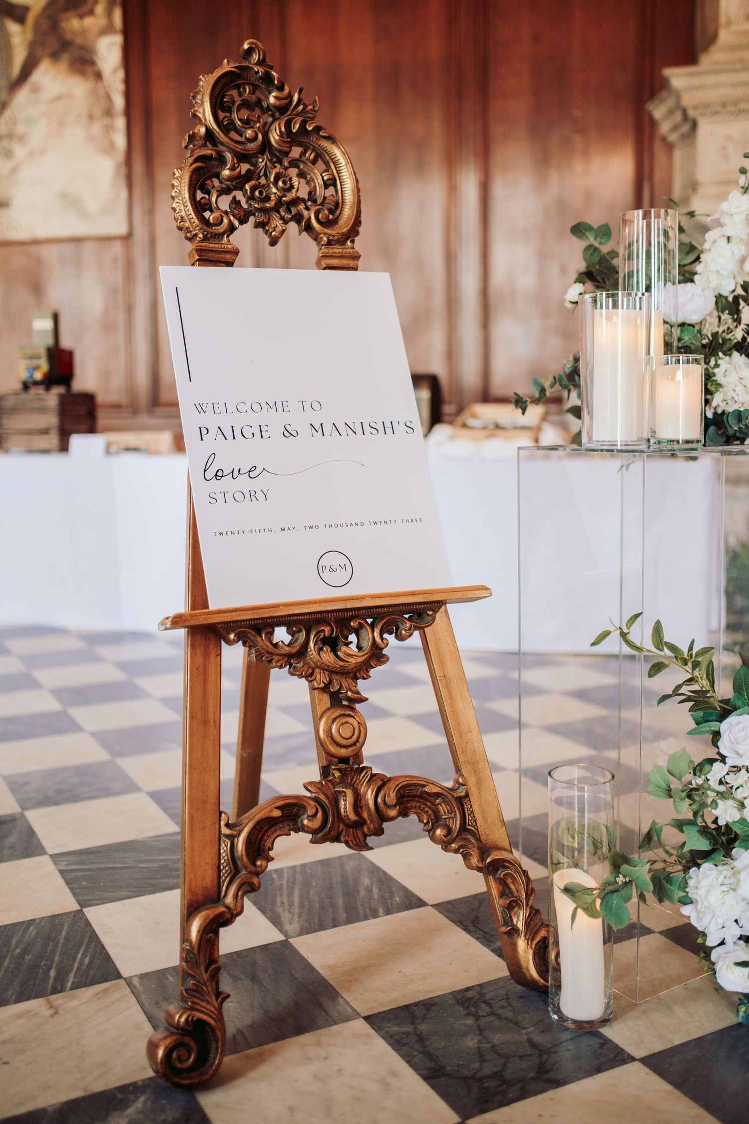 Bride and groom in North Mymms Park's elegant reception hall, perfect for timeless wedding photography.