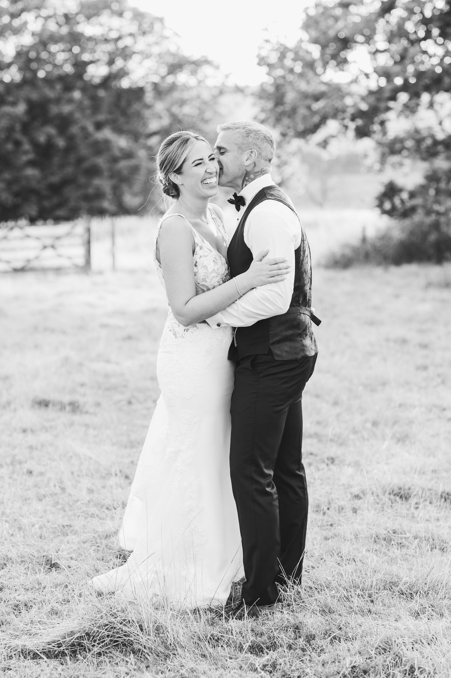Beautiful wedding at Gaynes Park, Essex, featuring rustic barns, stunning gardens, and romantic outdoor photography in a picturesque setting