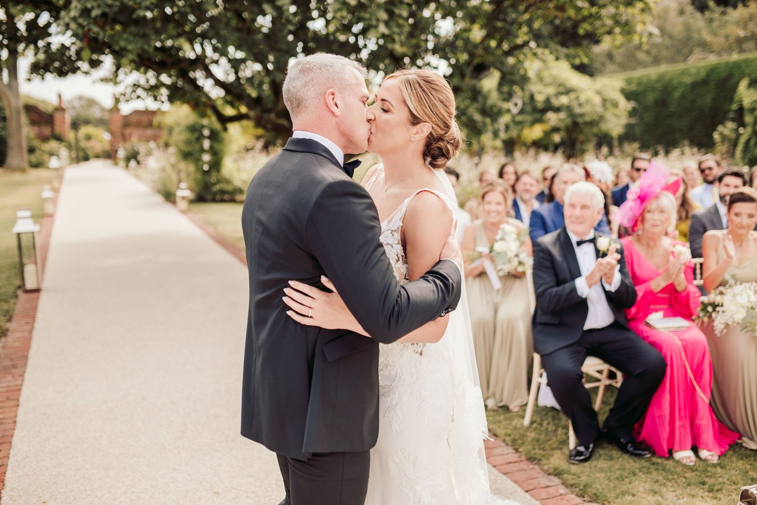 Beautiful wedding at Gaynes Park, Essex, featuring rustic barns, stunning gardens, and romantic outdoor photography in a picturesque setting