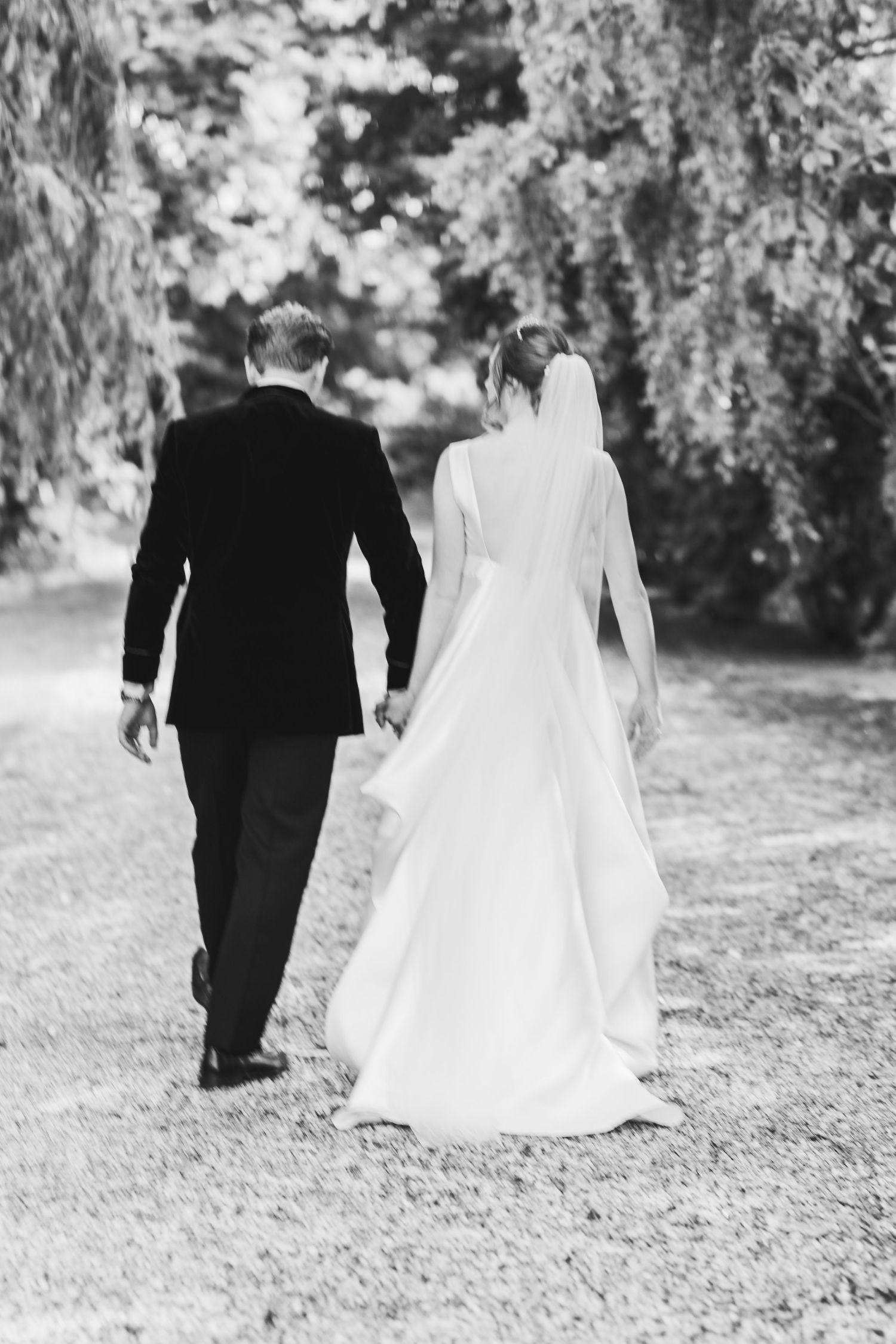 A black and white wedding photo sequence shows a couple walking away together on a garden path.