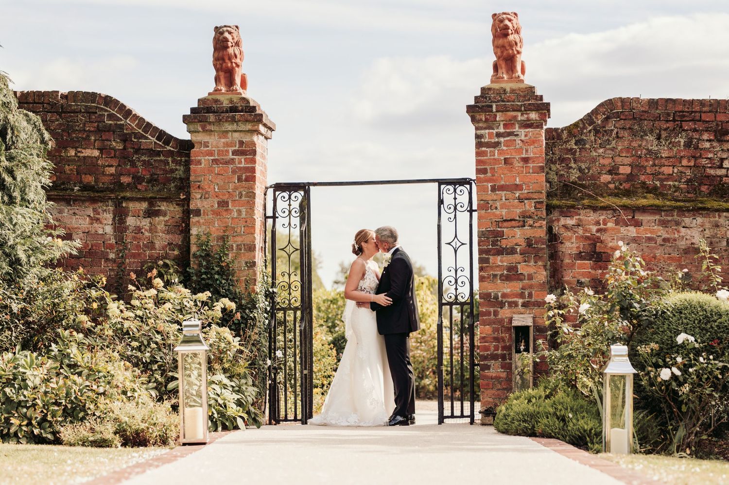 Beautiful wedding at Gaynes Park, Essex, featuring rustic barns, stunning gardens, and romantic outdoor photography in a picturesque setting