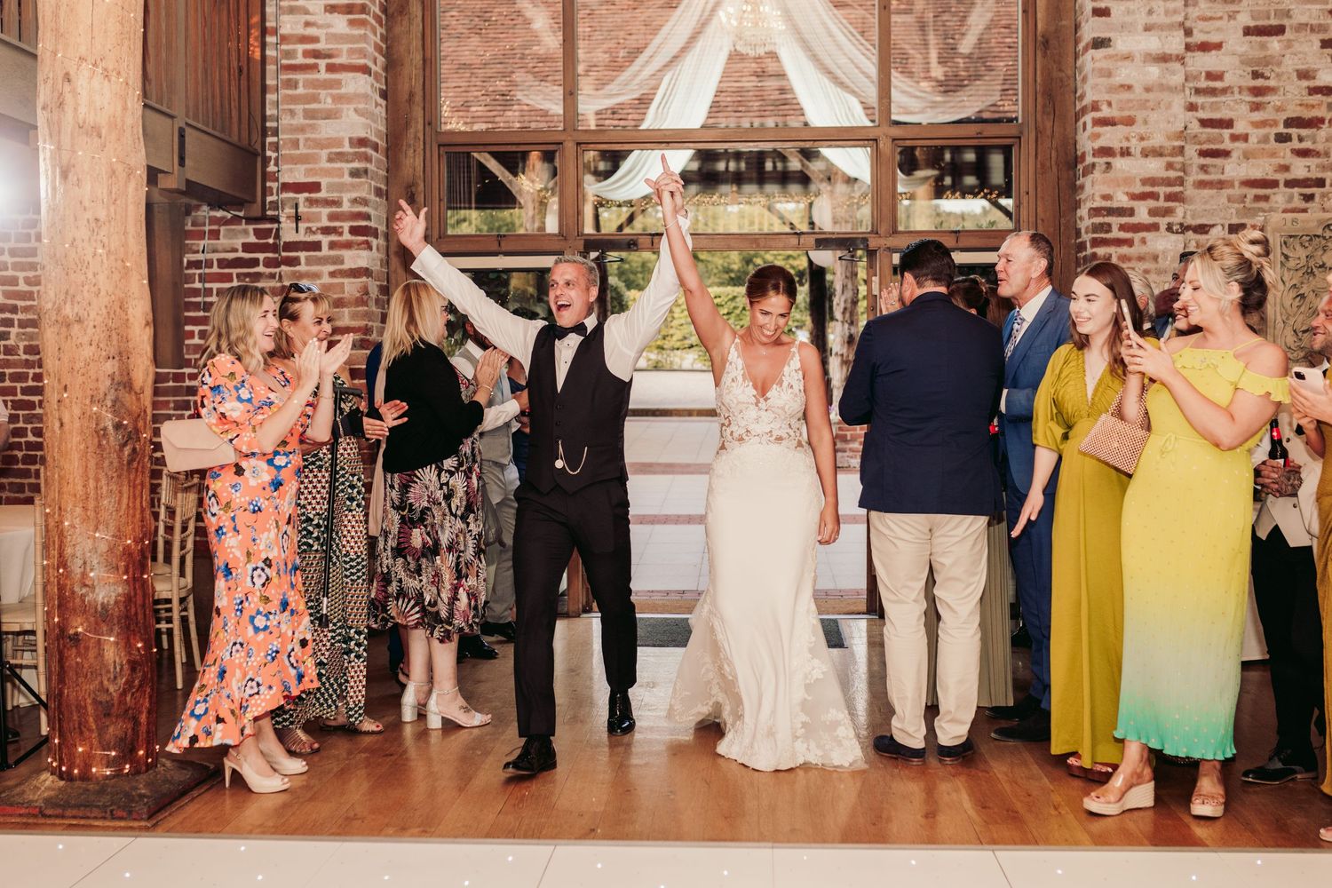 Beautiful wedding at Gaynes Park, Essex, featuring rustic barns, stunning gardens, and romantic outdoor photography in a picturesque setting