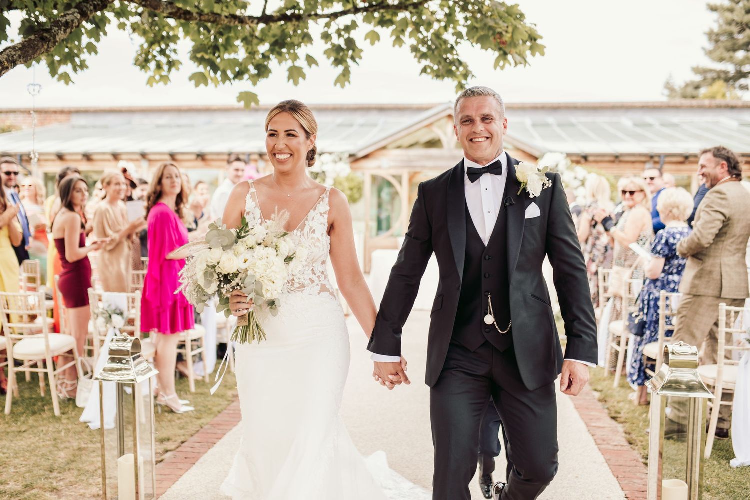 Beautiful wedding at Gaynes Park, Essex, featuring rustic barns, stunning gardens, and romantic outdoor photography in a picturesque setting