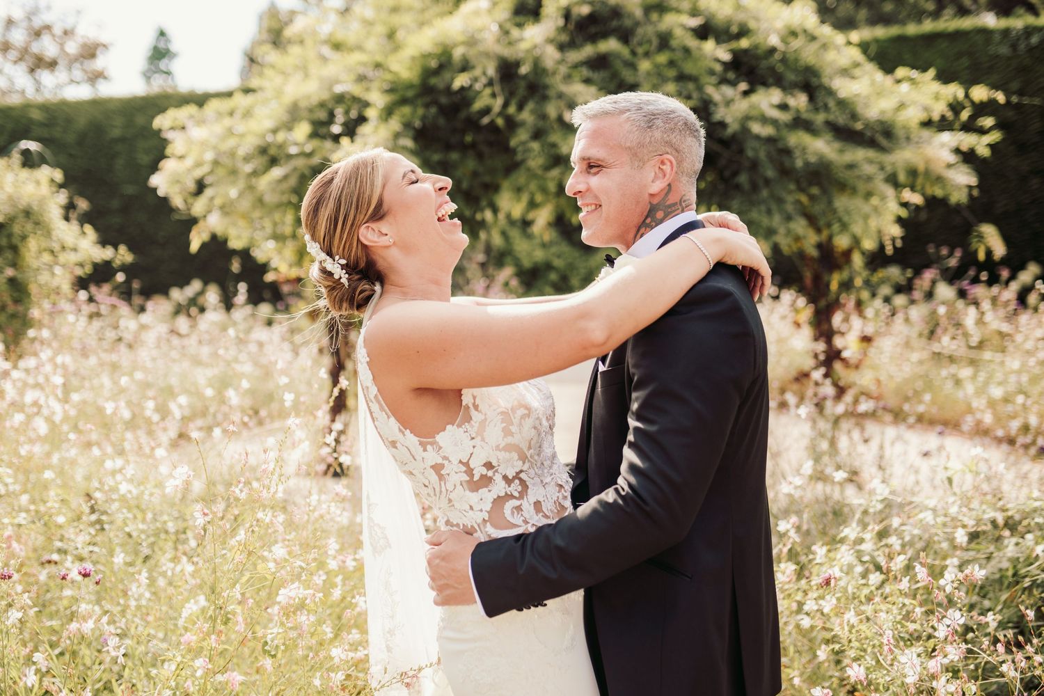 Beautiful wedding at Gaynes Park, Essex, featuring rustic barns, stunning gardens, and romantic outdoor photography in a picturesque setting