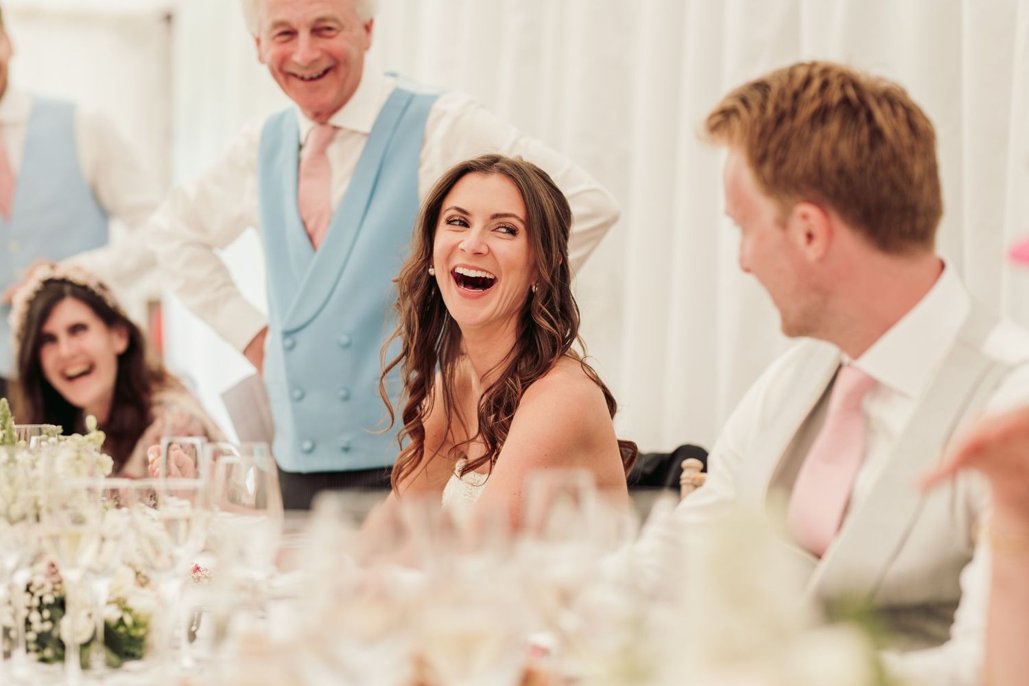 Glemham Hall Wedding Venue in Suffolk Countrysid Exchange Vows in Glemham Hall's Great HallTable Setup in Marquee with Pastel Flowers