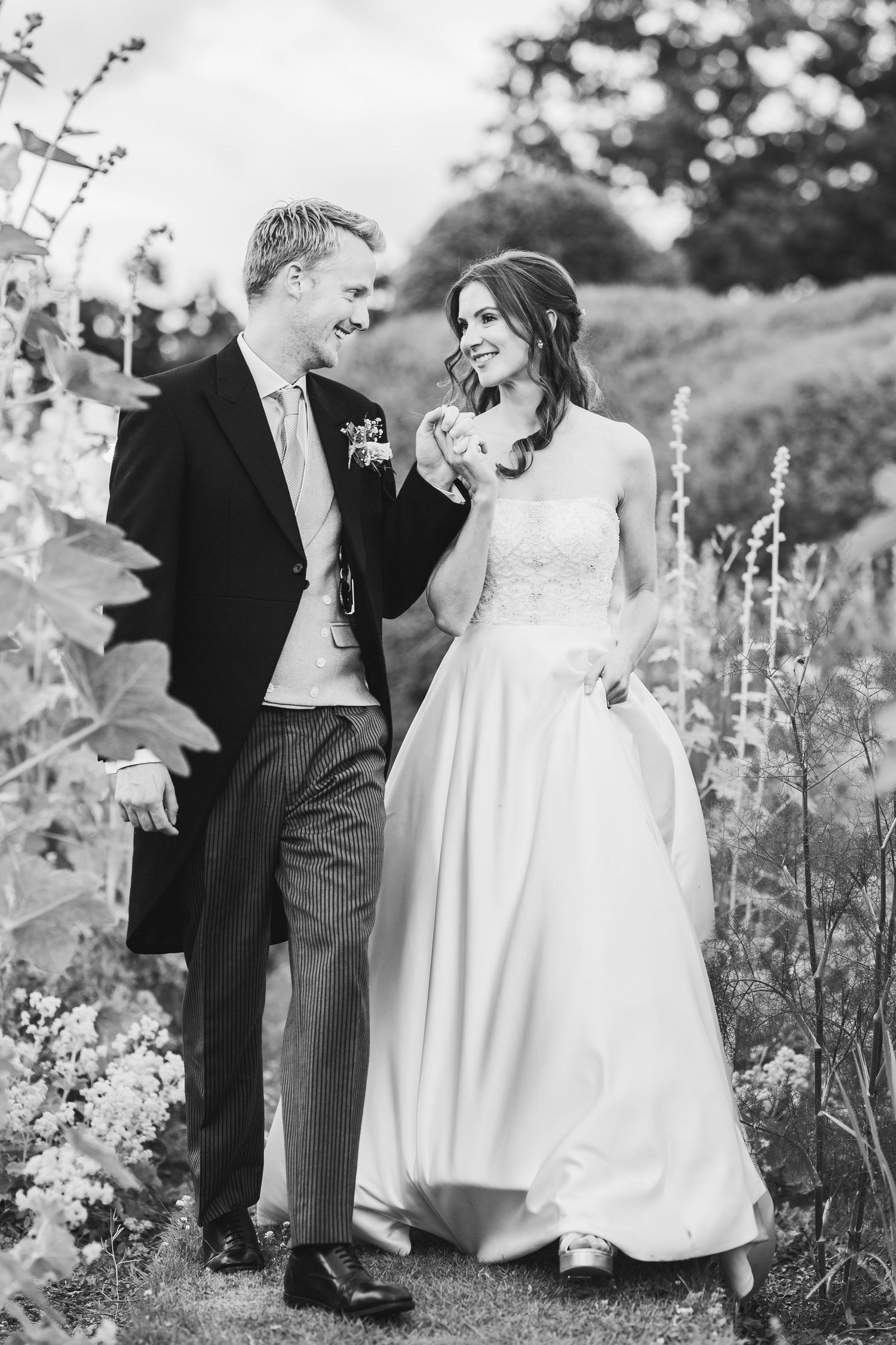 Glemham Hall Wedding Venue in Suffolk Countrysid Exchange Vows in Glemham Hall's Great HallTable Setup in Marquee with Pastel Flowers