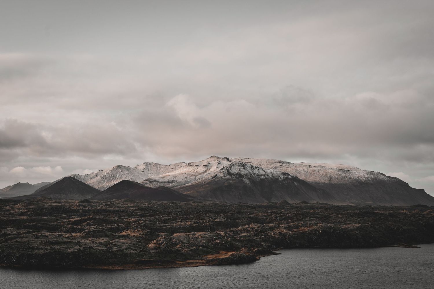 Icelandic mountain range with stunning clouds above it
