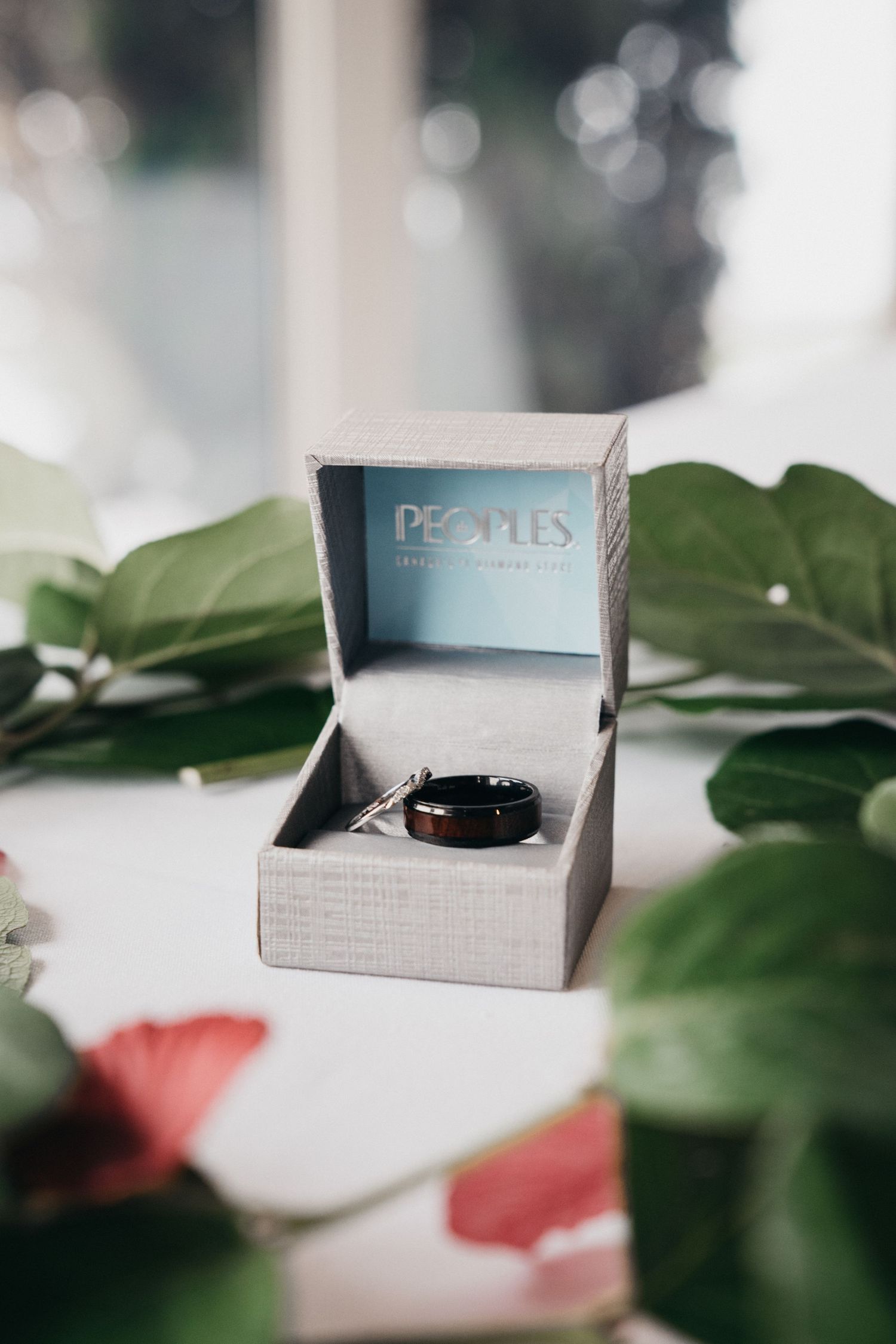 Wedding band details surrounded by decor