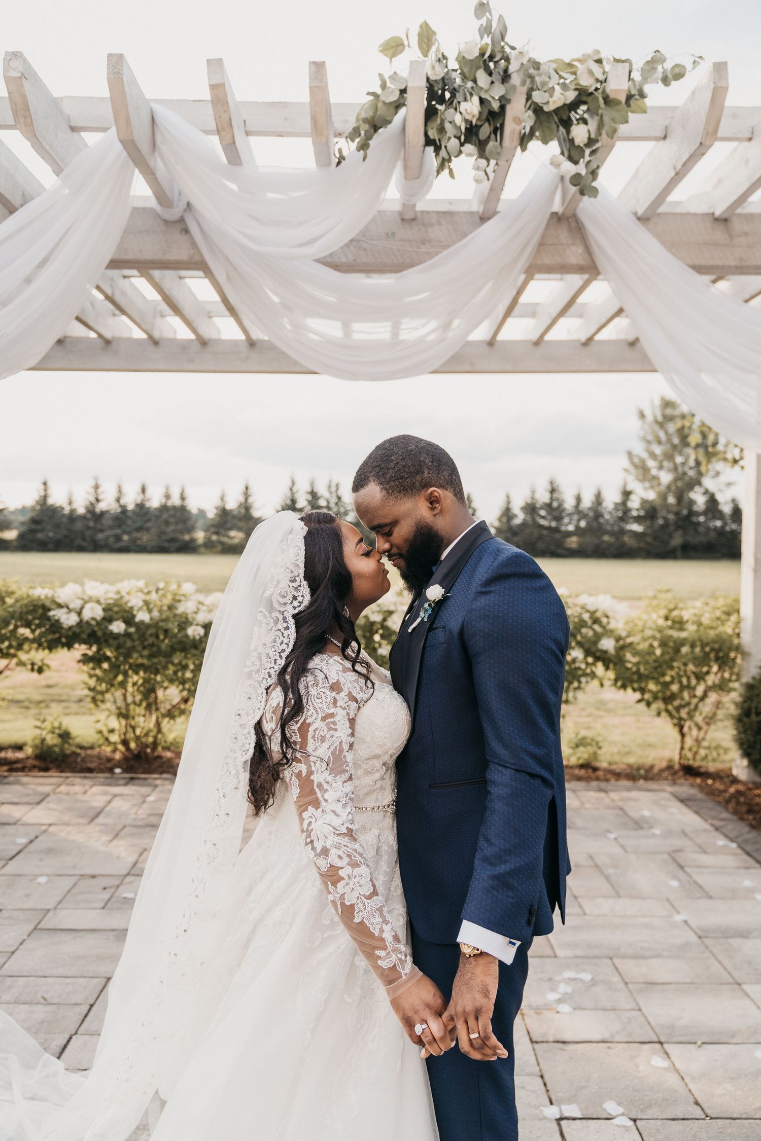 Ottawa micro-wedding with couple sharing an intimate first kiss.