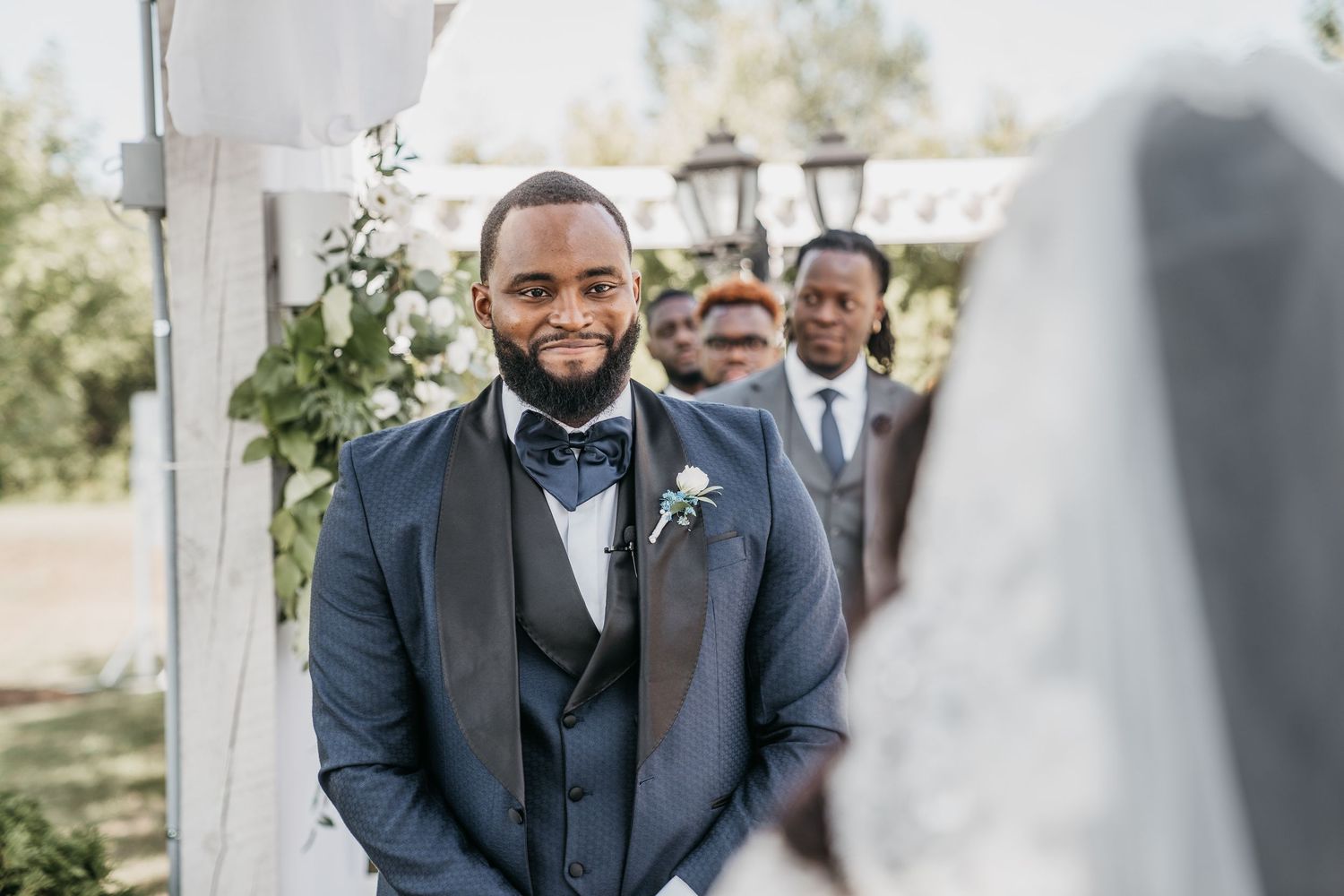 Ceremony photo of the groom at a gorgeous outdoor wedding outside of Ottawa Ontario.