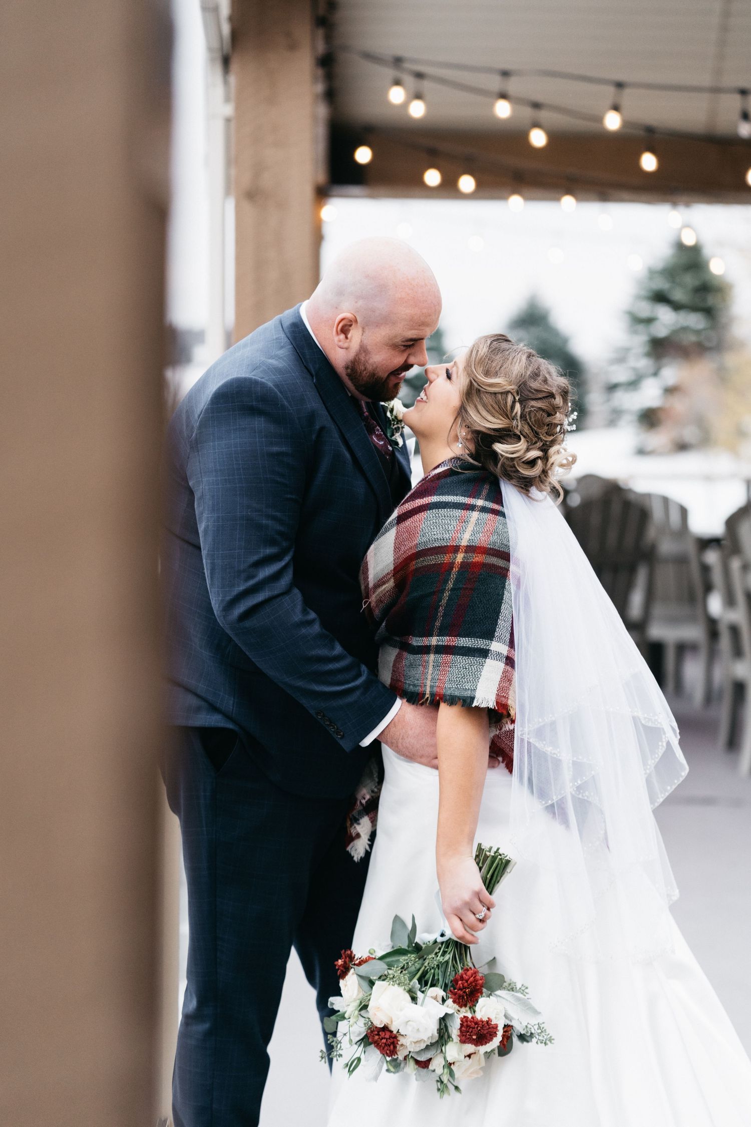 Bride and Groom share a kiss following an intimate winter wedding in Barrie Ontario.