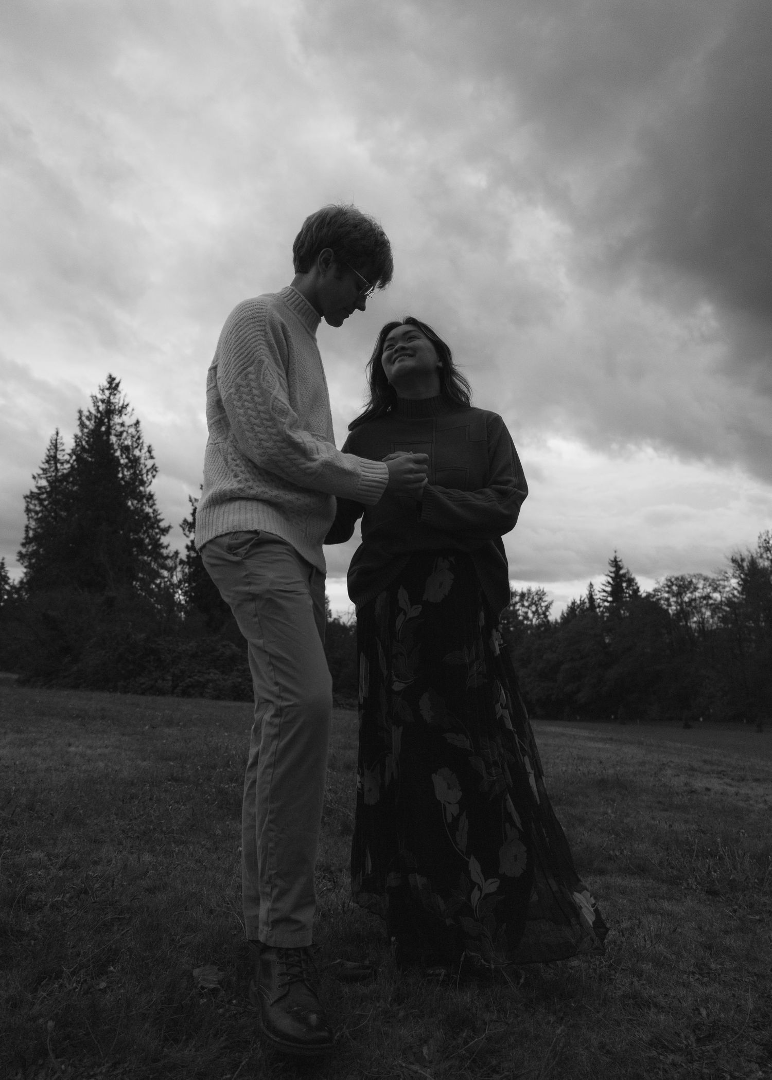 Black and white of couple outside, storytelling session