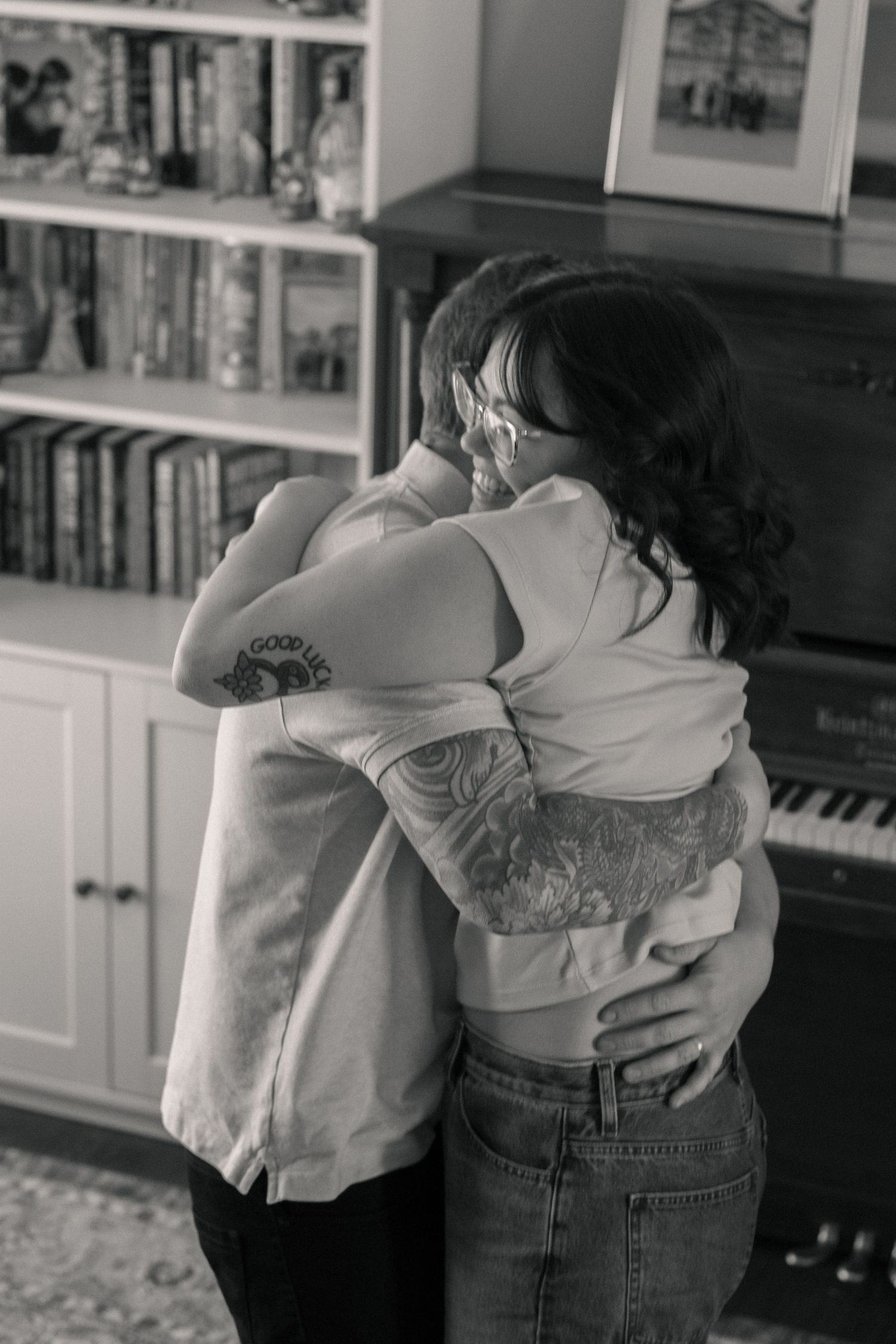 Black and white photo, couple embracing, documentary photography