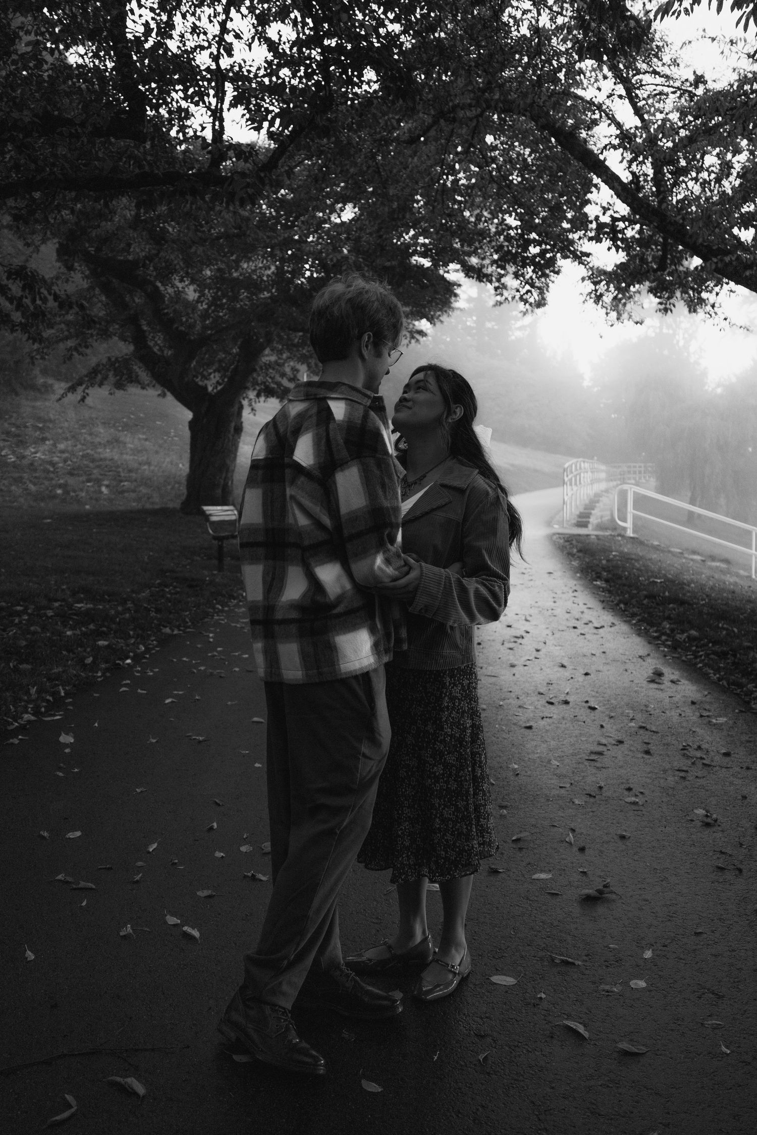 Black and white of couple outside, storytelling session, editorial image
