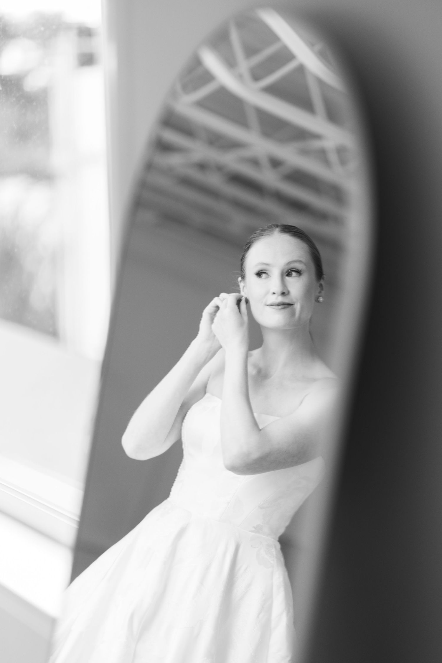 Soft focus black and white portraits showing elegant bridal preparation moments.