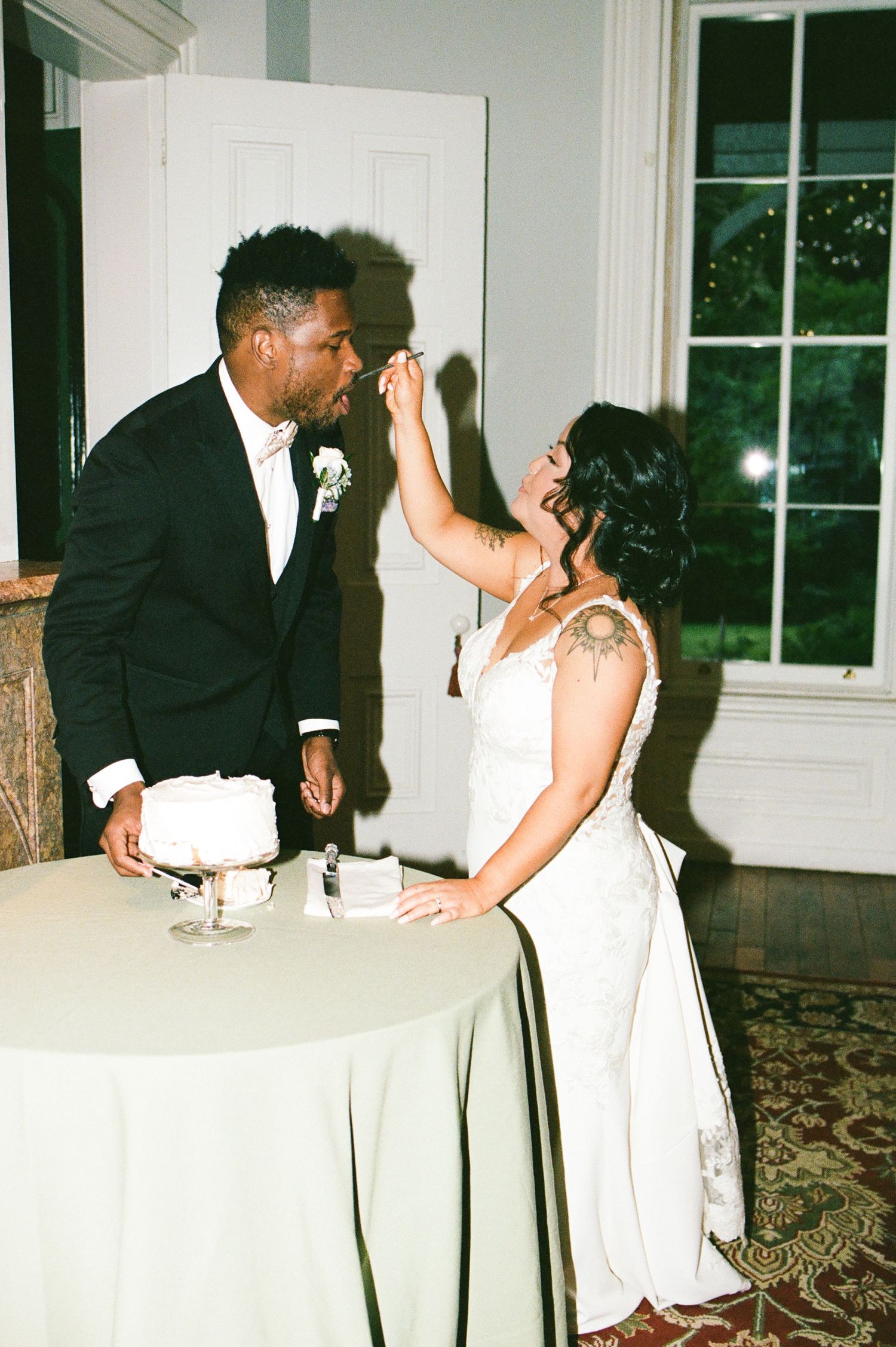 Wedding reception sequence showing playful interactions between newlyweds.