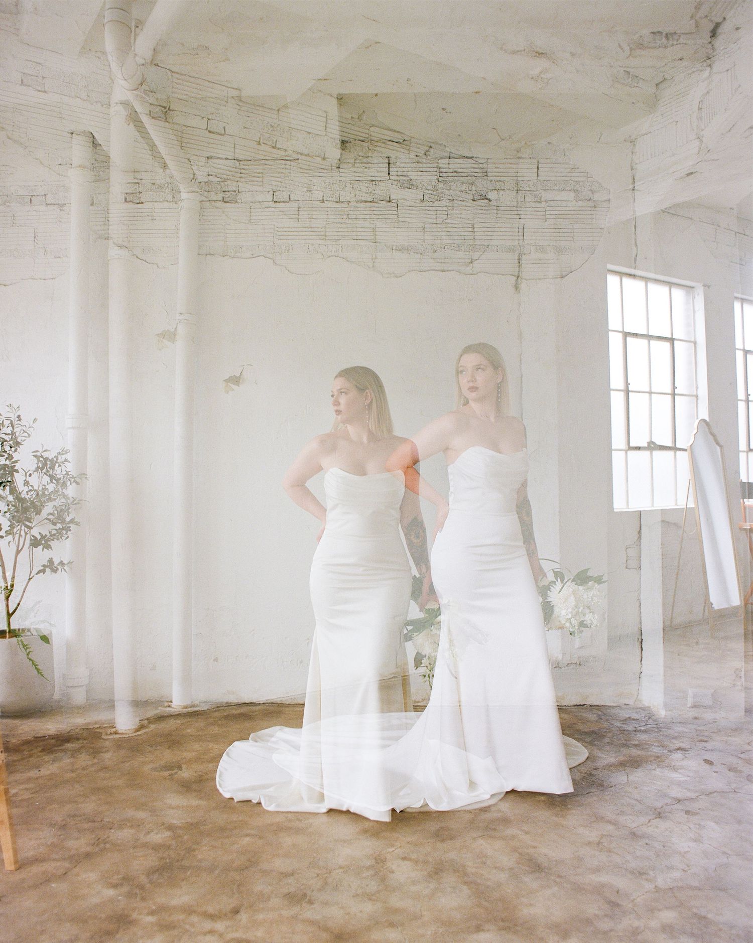 Ethereal wedding photography sequence in a bright white industrial space with flowing dresses.
