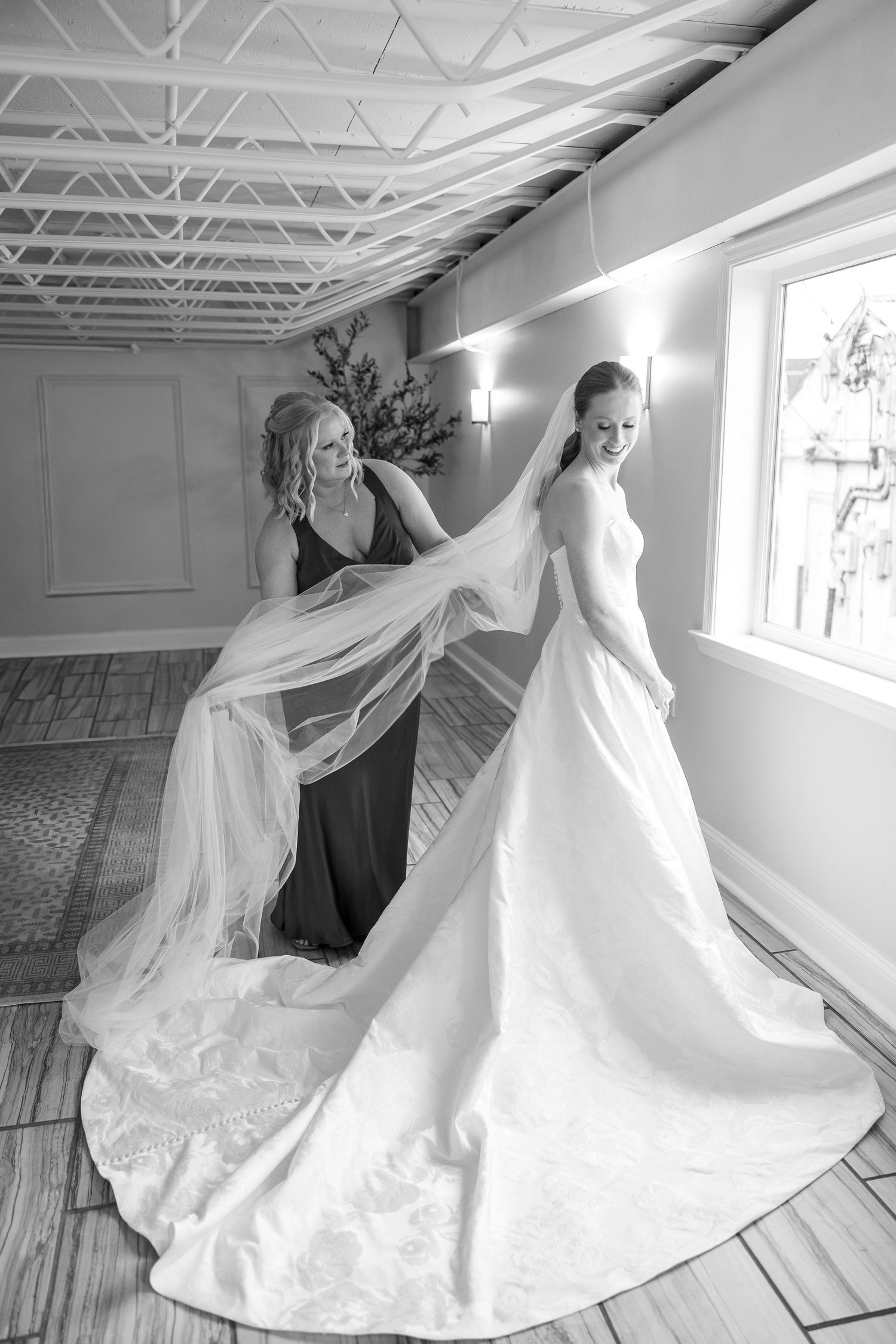 Dynamic shots of a wedding dress in motion as it twirls in a bright studio setting.