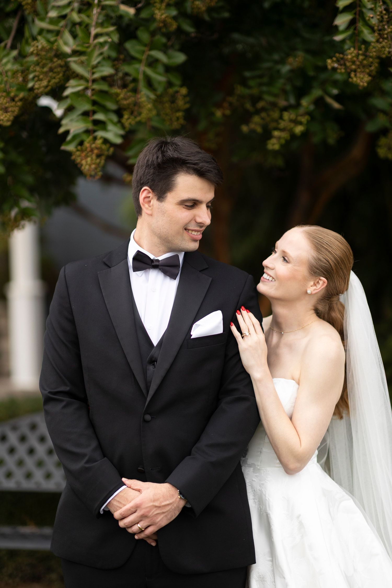 A series of intimate wedding portraits showing joyful expressions against a garden backdrop.