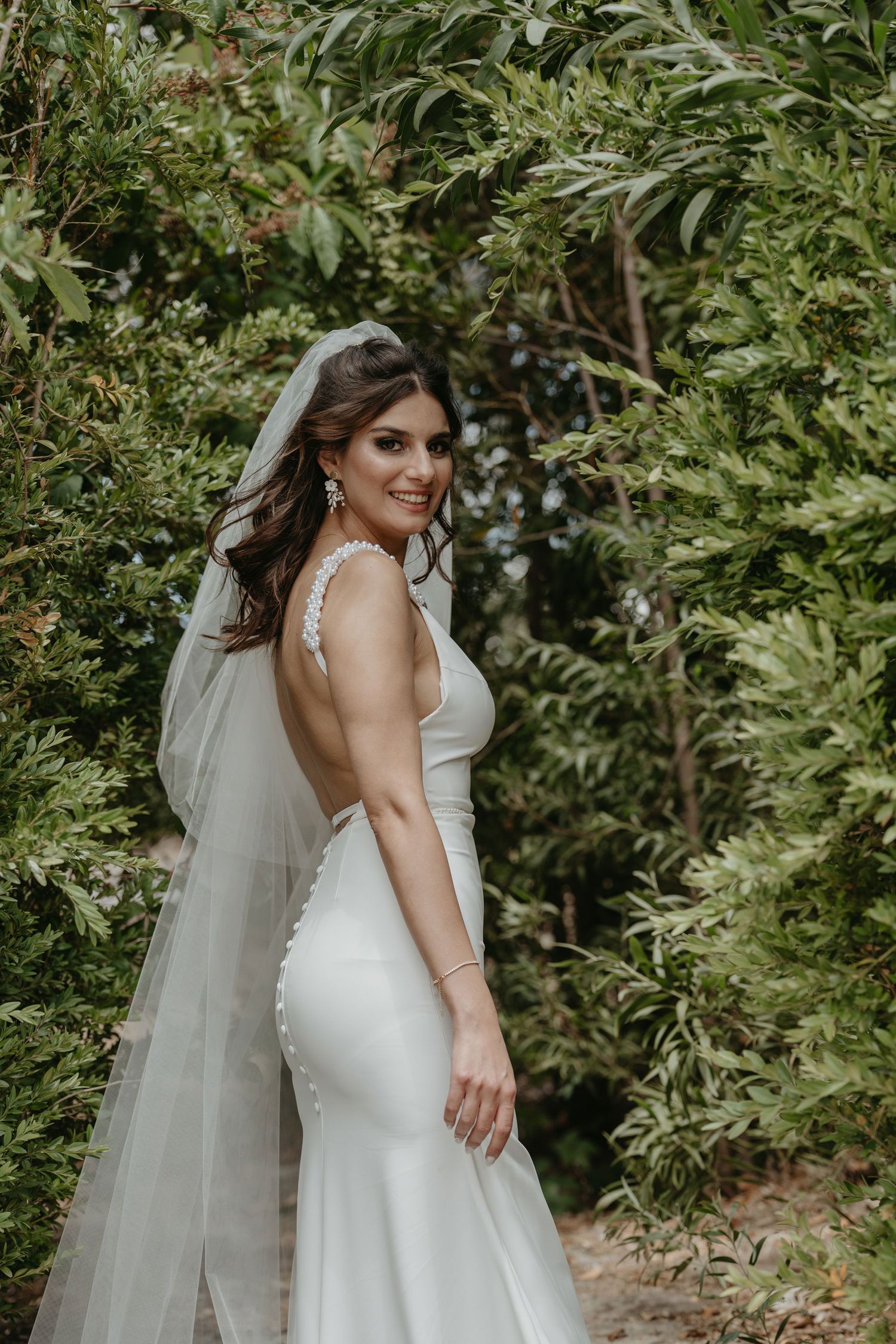 Elegant bridal portrait outdoors on her wedding day in Portugal