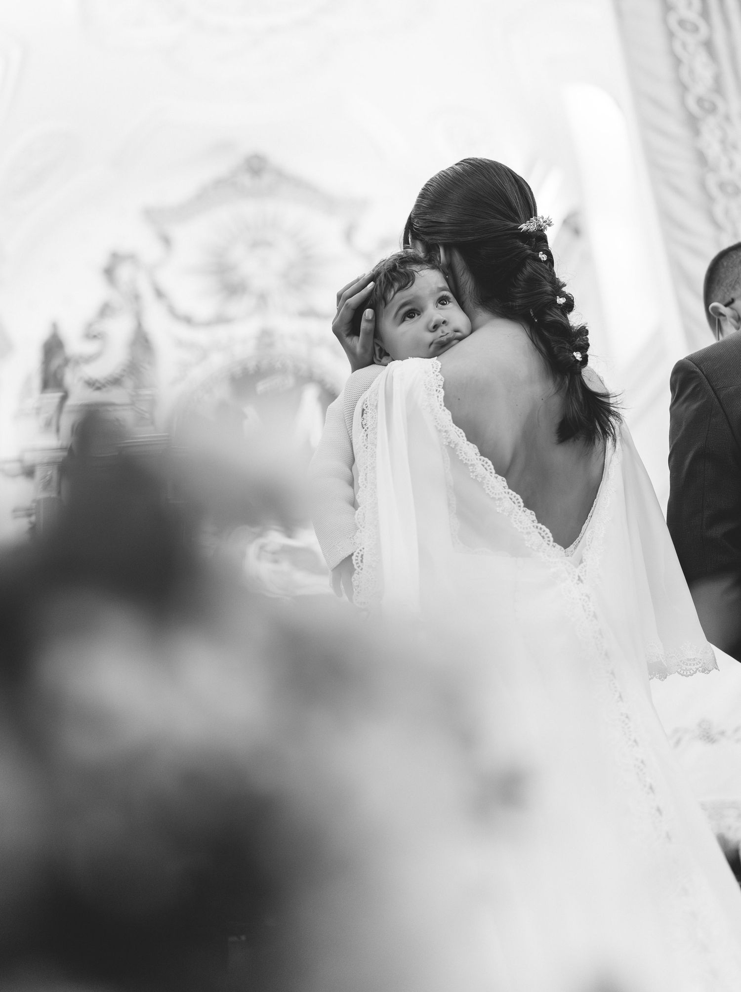 Emotional black and white moment during their wedding day