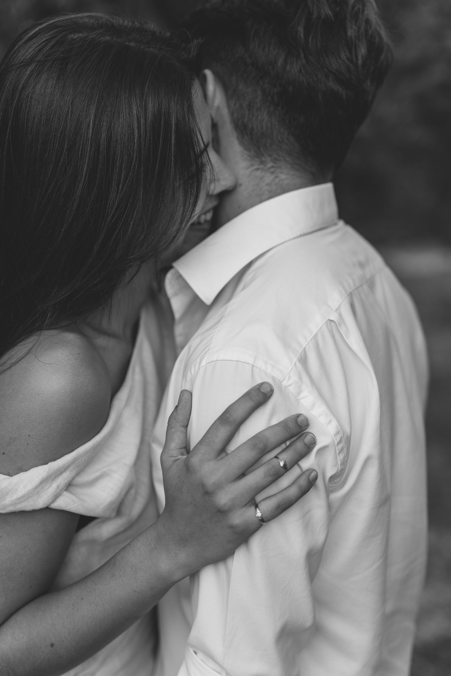 Intimate candid moment between a couple during their engagement session