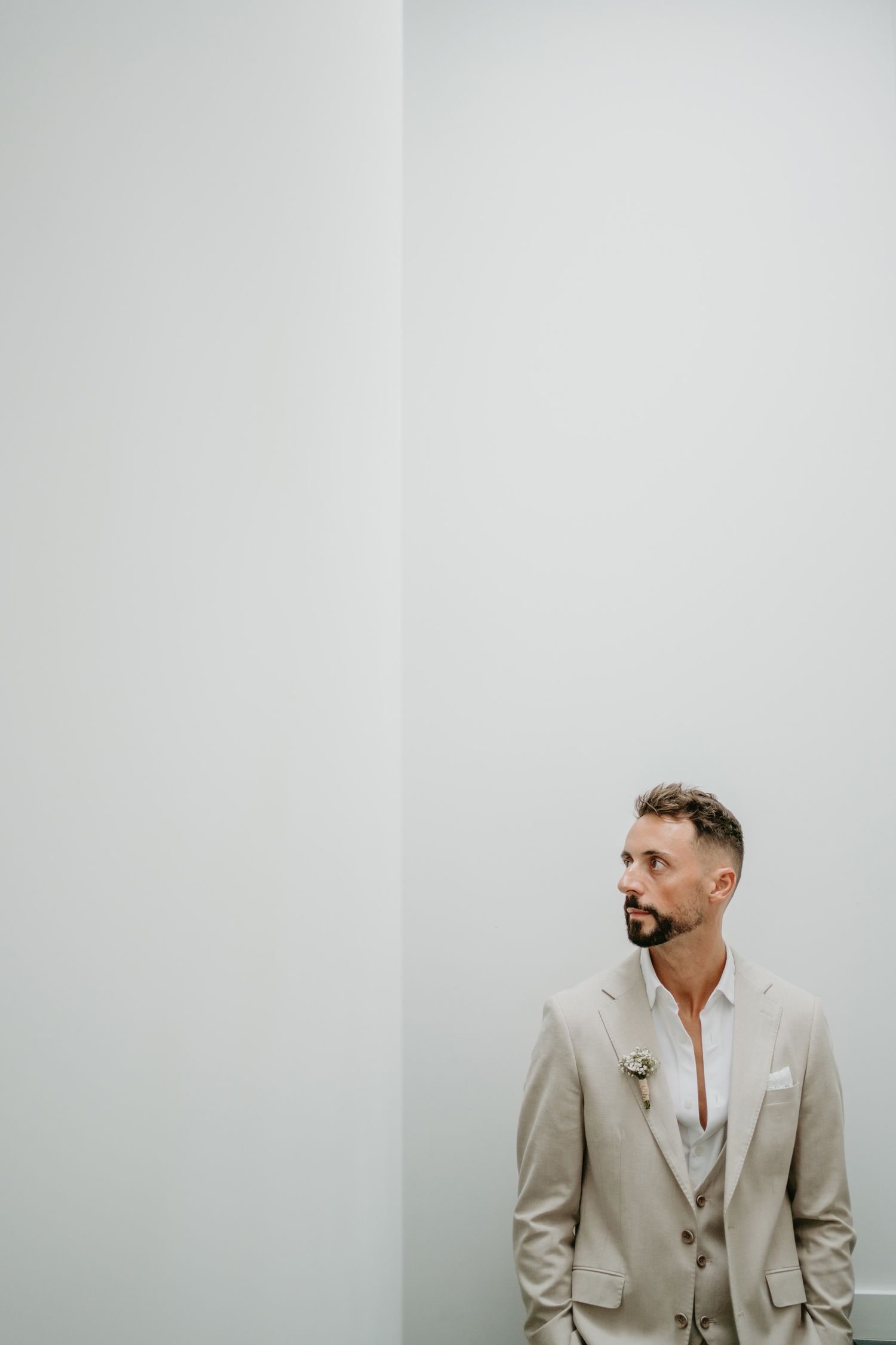 Minimalist groom portrait on his wedding day in portugal