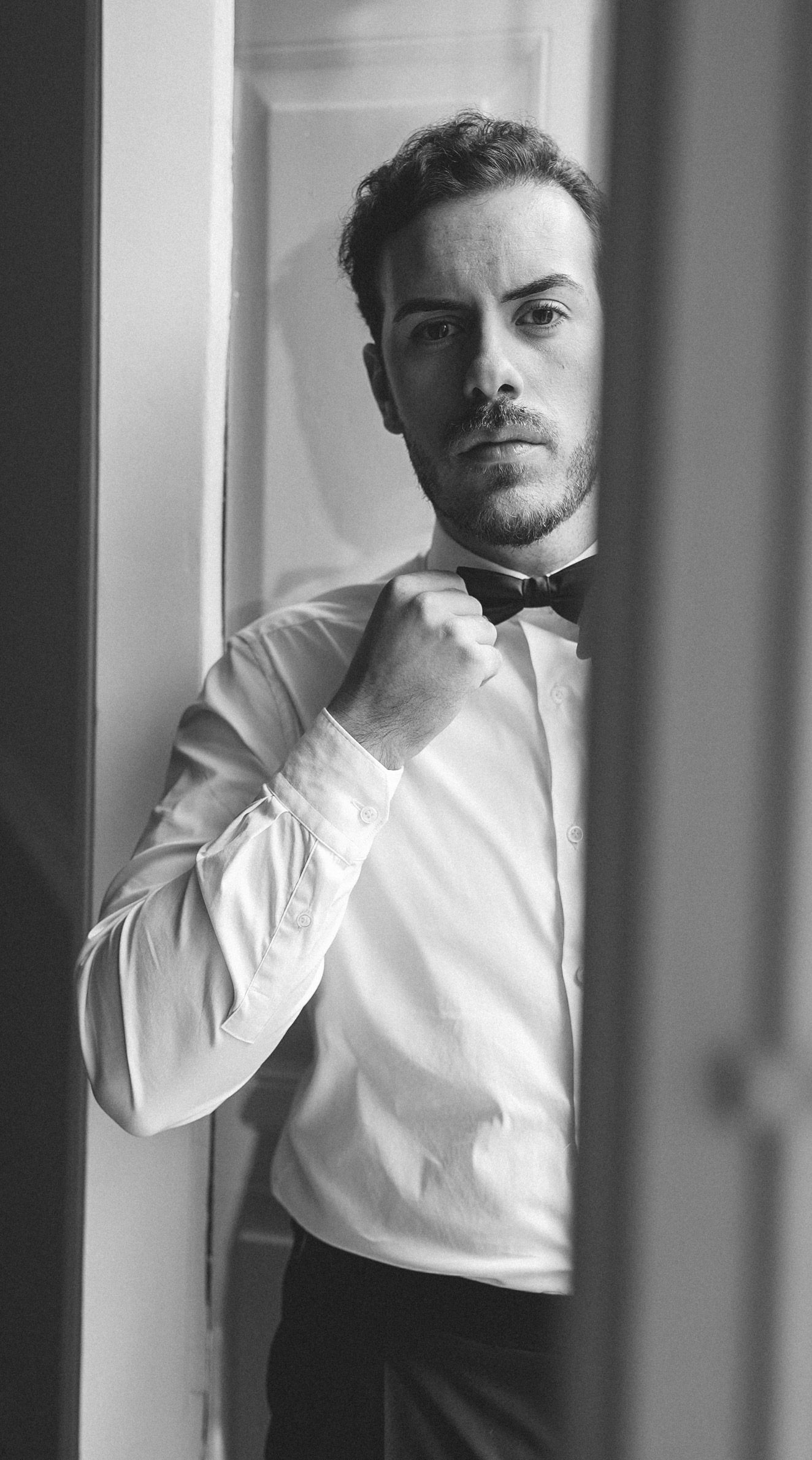 Groom getting ready for his wedding at Camélia Gardens in Sintra, Portugal