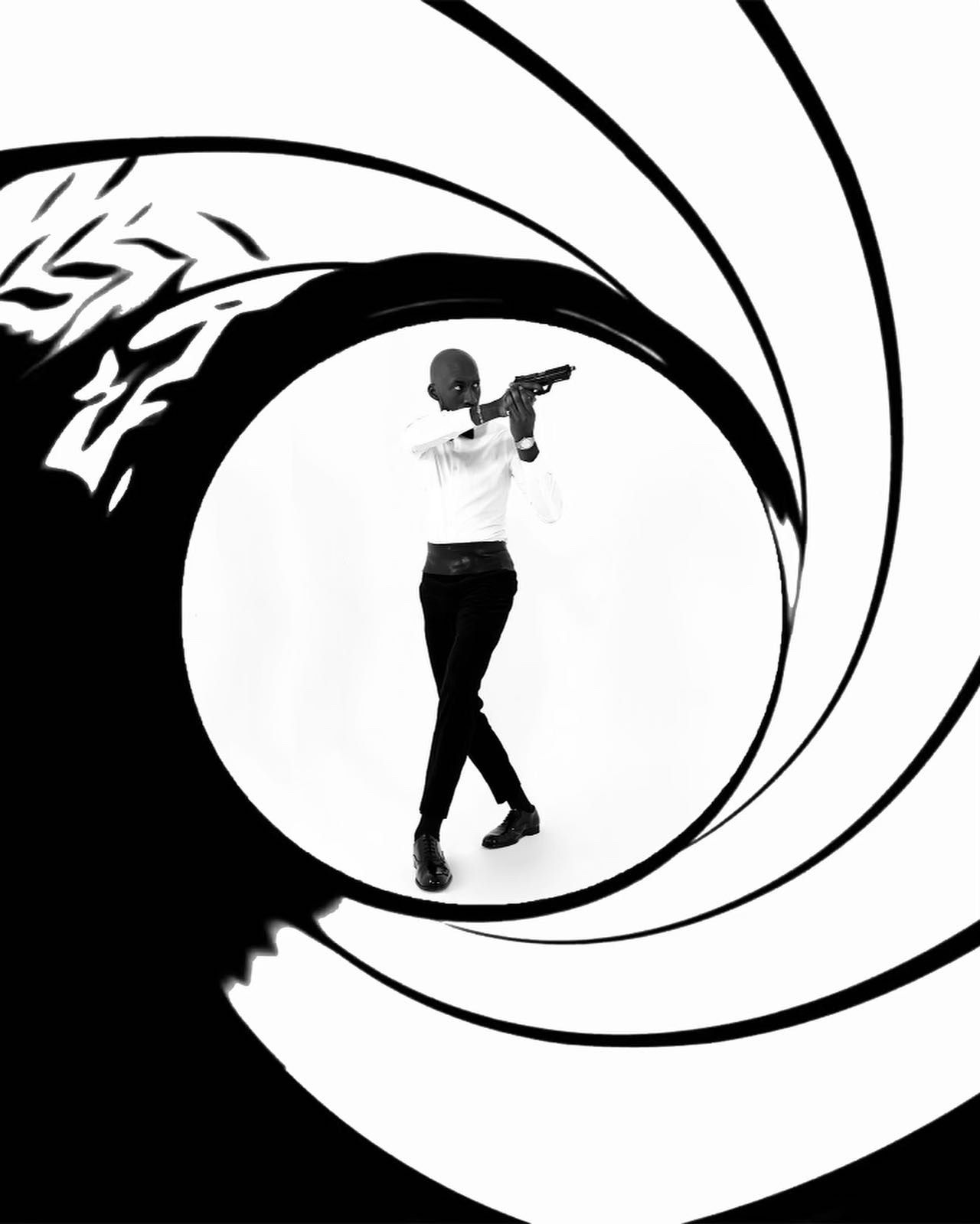 Classic gun barrel sequence silhouettes in black and white spiral design. PZ STUDIO VISUALS  007 now 011 - A NEW DAWN