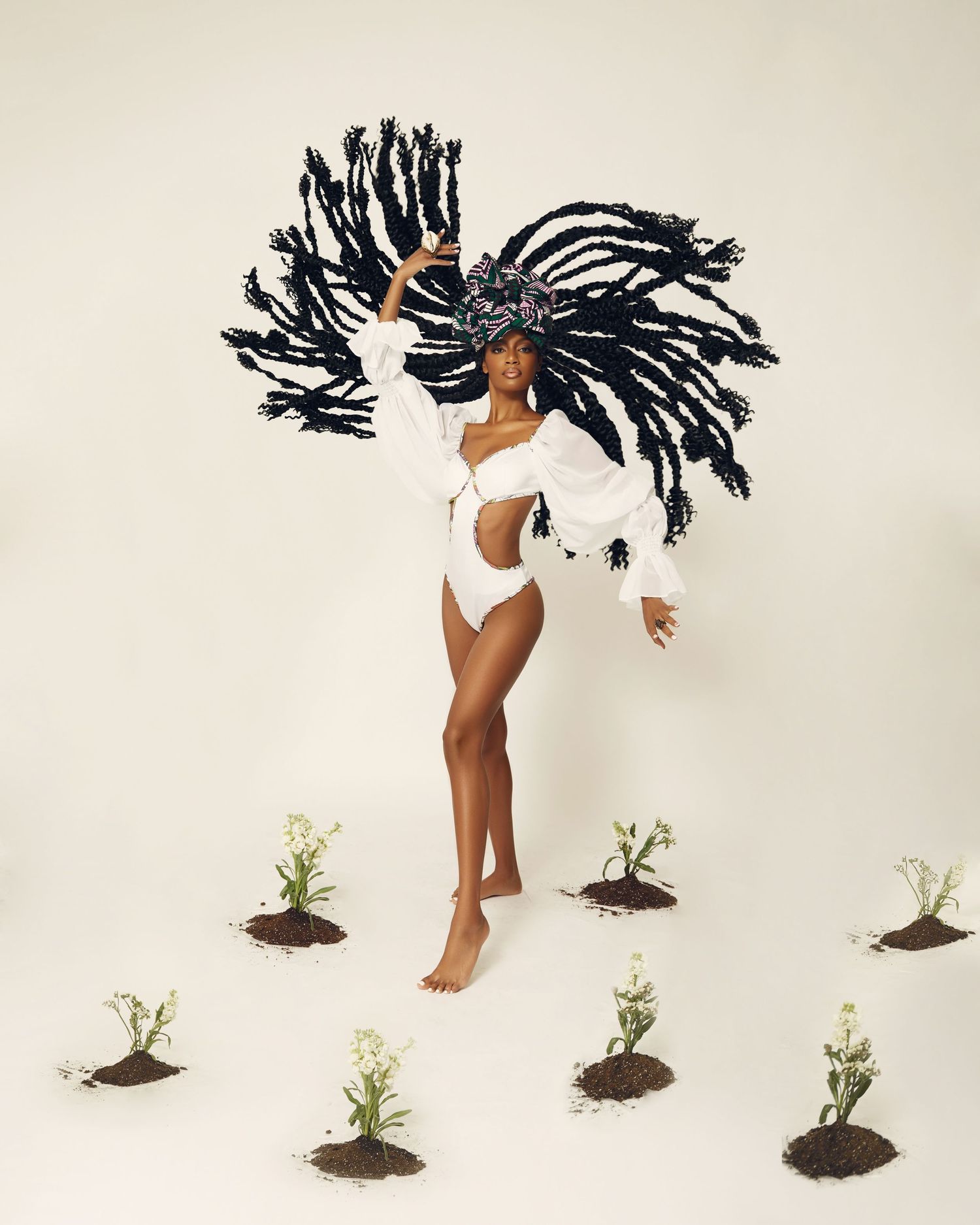 A sequence of five images showing a dancer in white leotard performing expressive movements. Ebonee Davis by Jacob Webster
