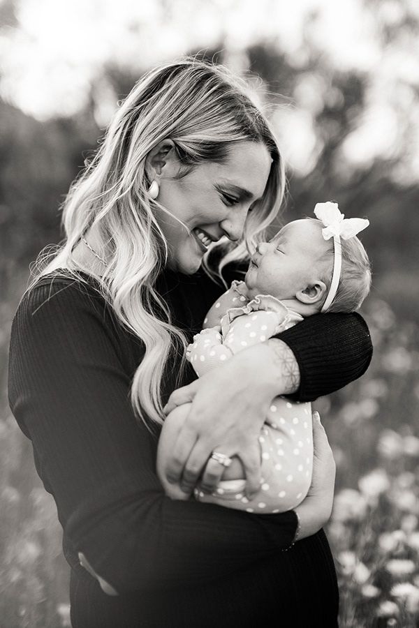 Black and white intimate portrait series showing tender moments of affection.
