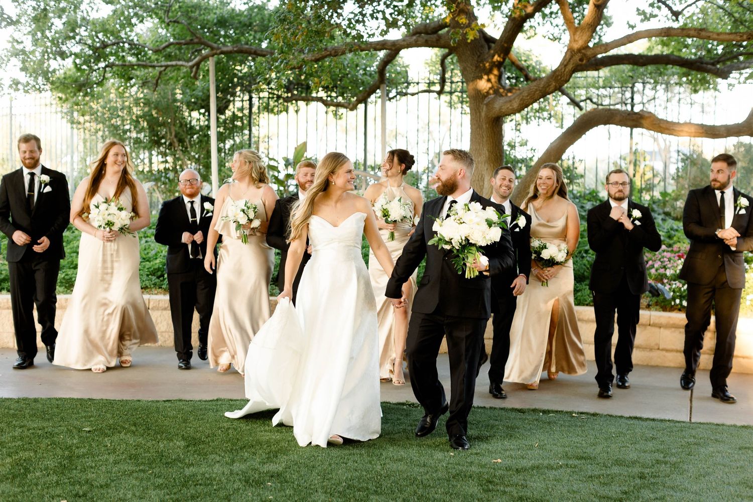 Candid shots of wedding party members walking and celebrating outdoors.