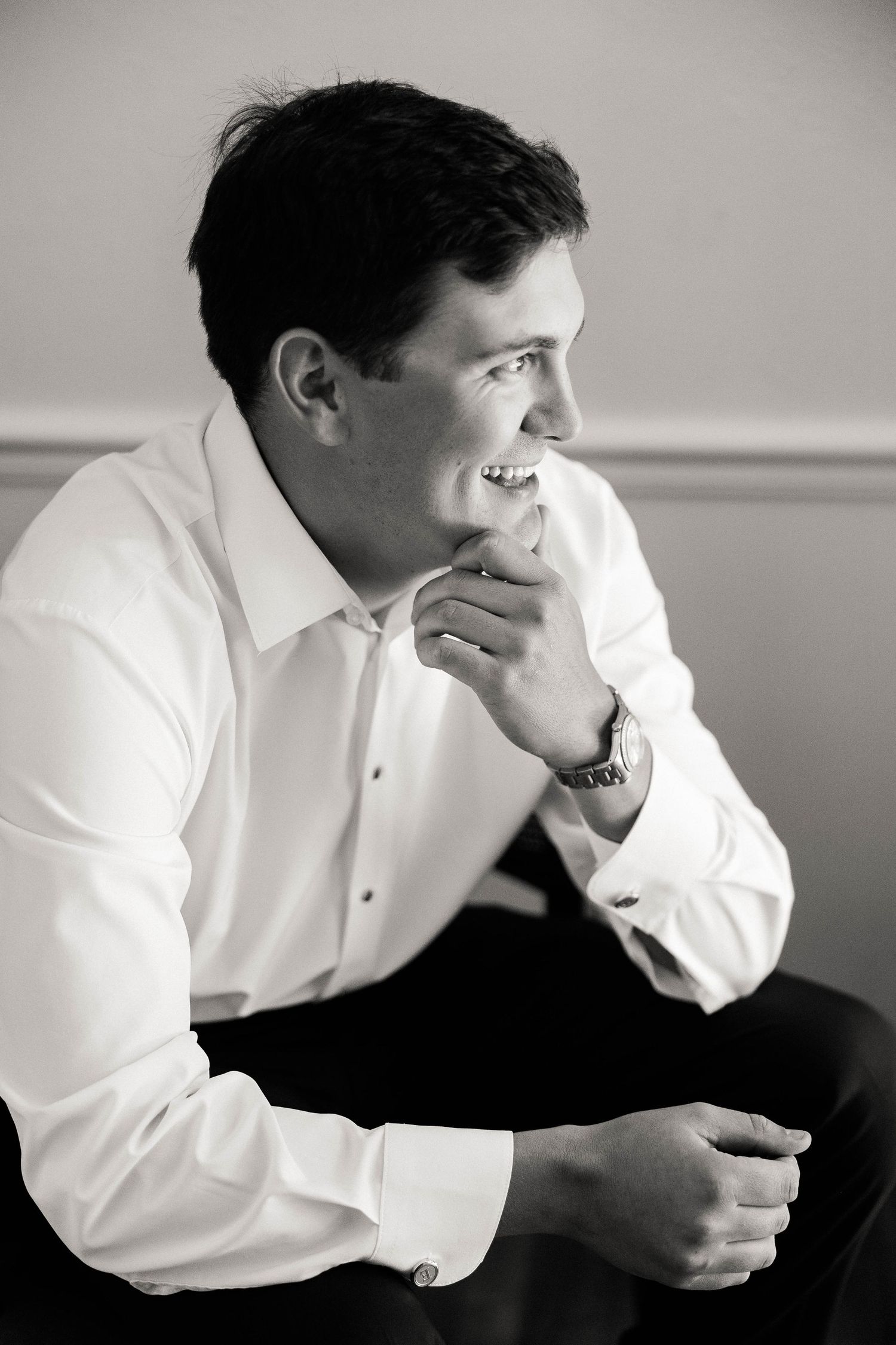 Black and white portrait series showing contemplative moments before wedding.
