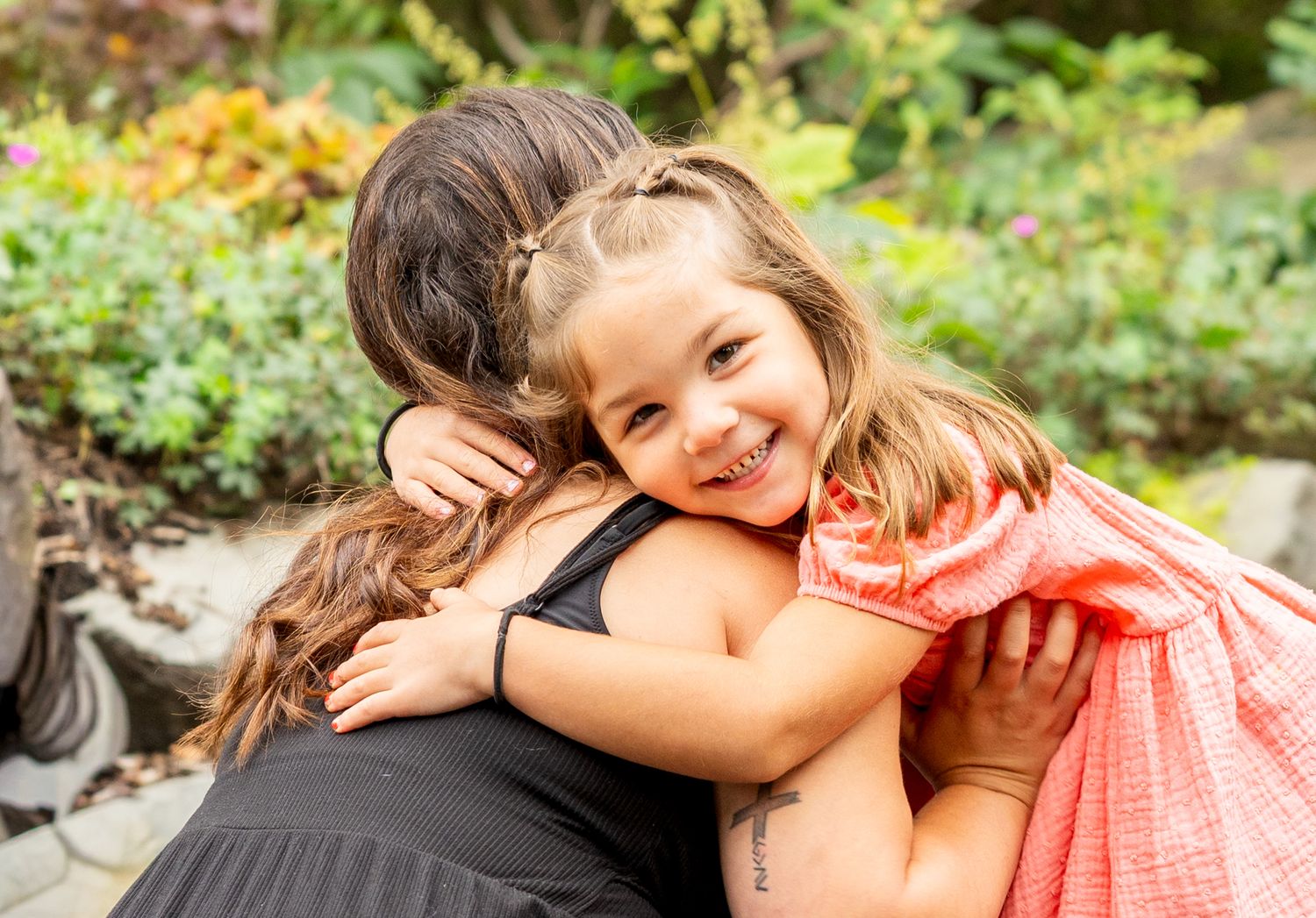 Intimate family moments captured in an outdoor autumn setting.