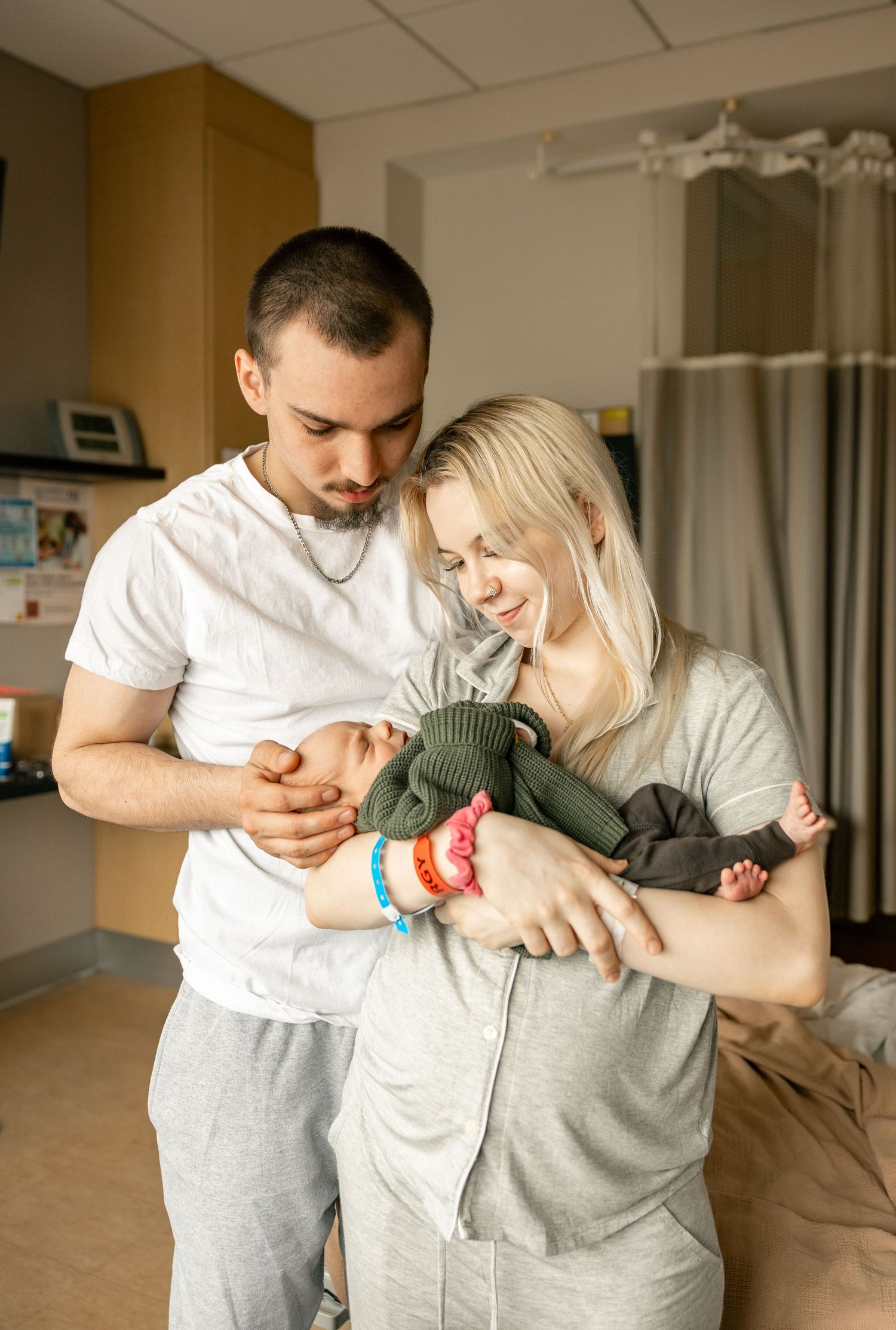 A couple embraces and shares playful moments in a series of candid indoor photos showing affection and laughter.