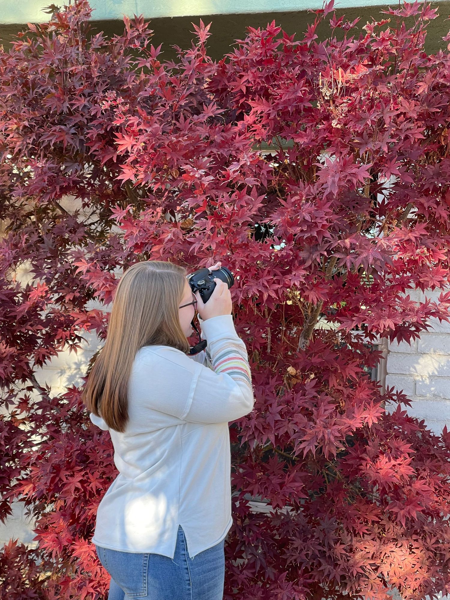 Rani taking pictures with camera