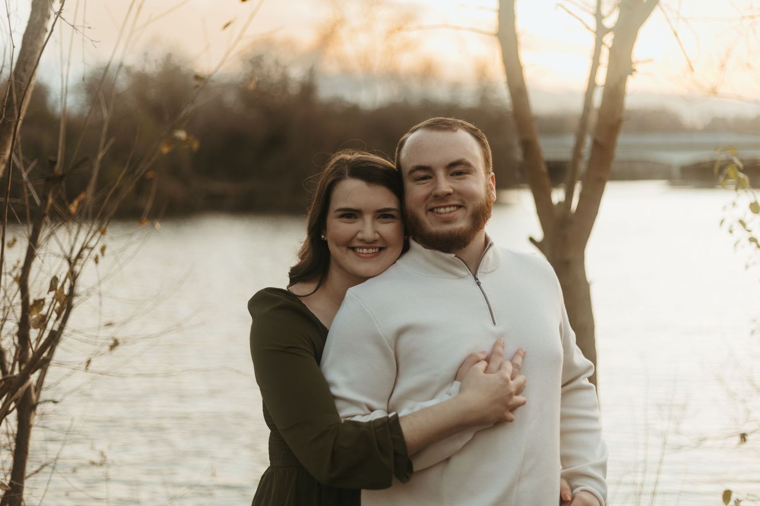 Candid couples photo session in Ann Arbor, Michigan captured in a park at golden hour