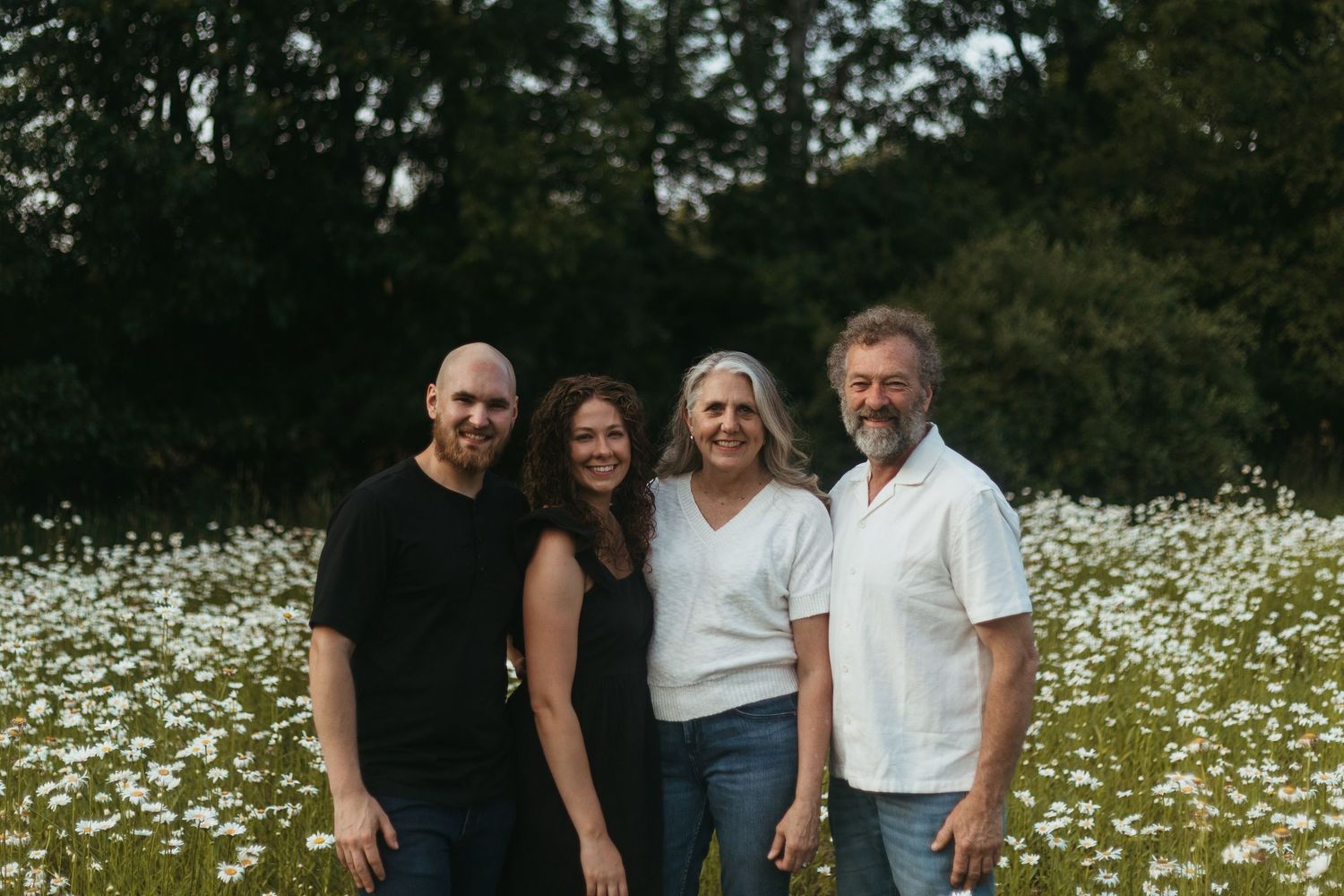 Lapeer Michigan family photography capturing a multi-generation family portrait outdoors in natural light