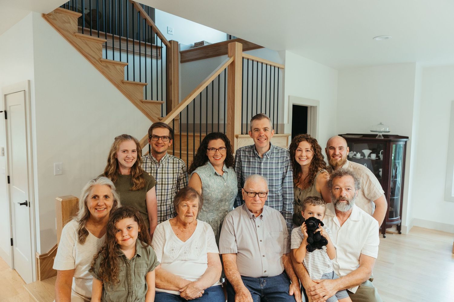 Lapeer Michigan family photography capturing a multi-generation family portrait indoors in natural light