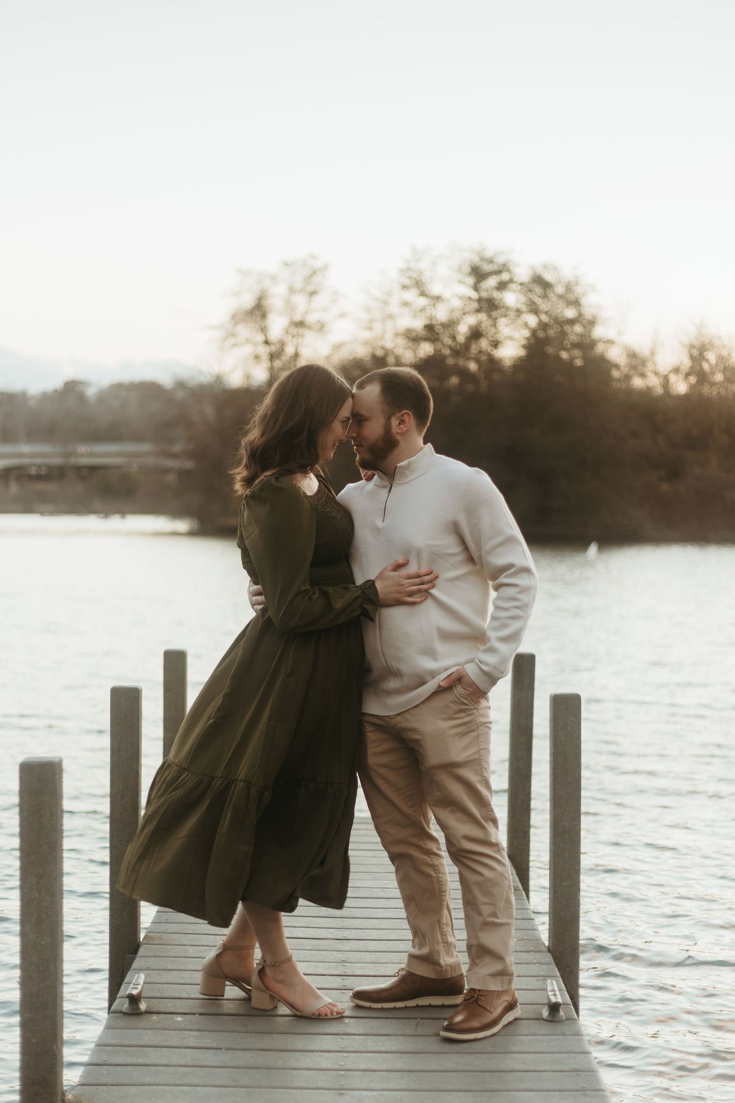 Romantic outdoor couples session in Ann Arbor, Michigan with a couple sharing a quiet moment at sunset
