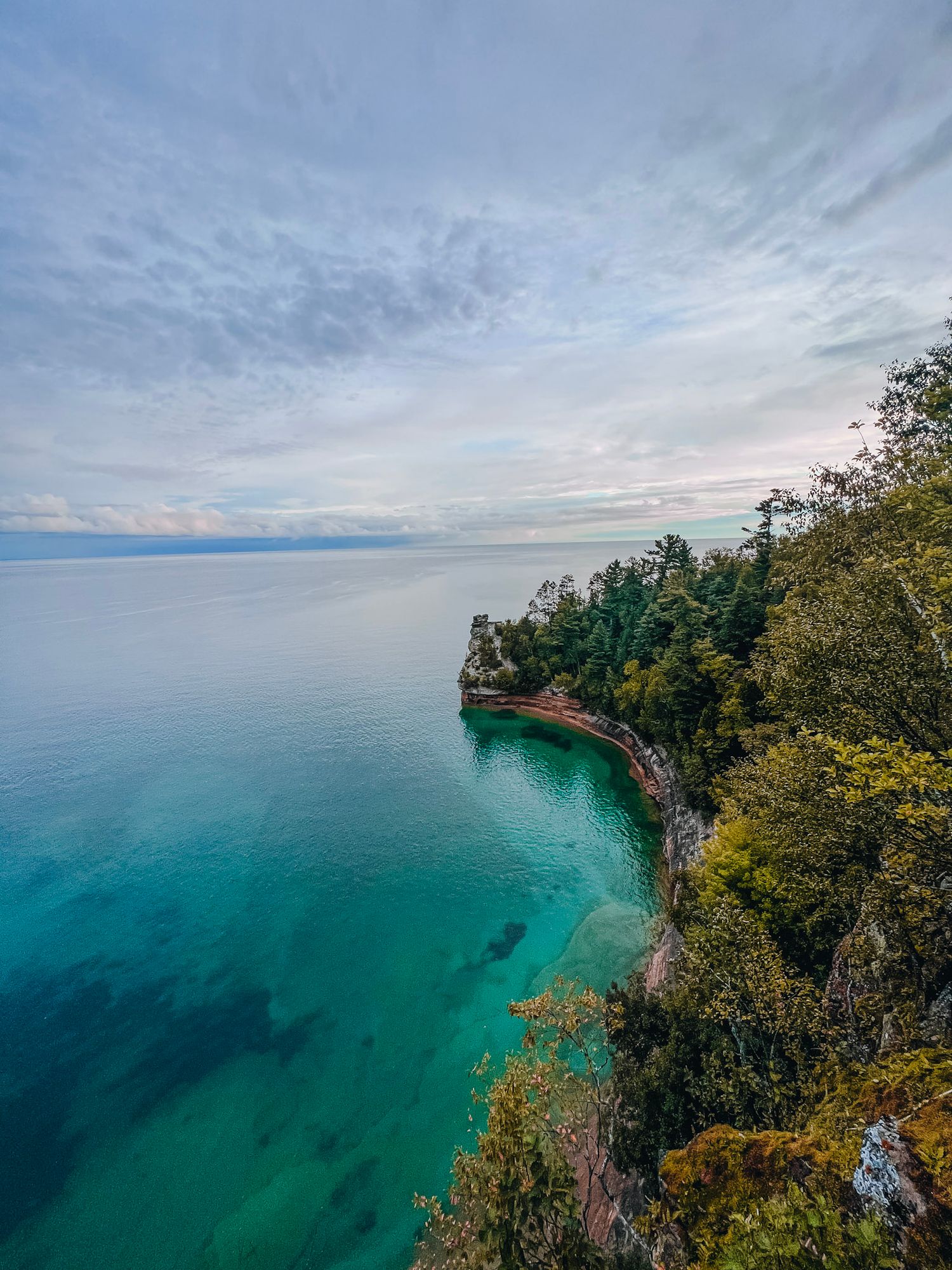 Miners Castle overlooking Lake Superior with dramatic sandstone cliffs and blue water