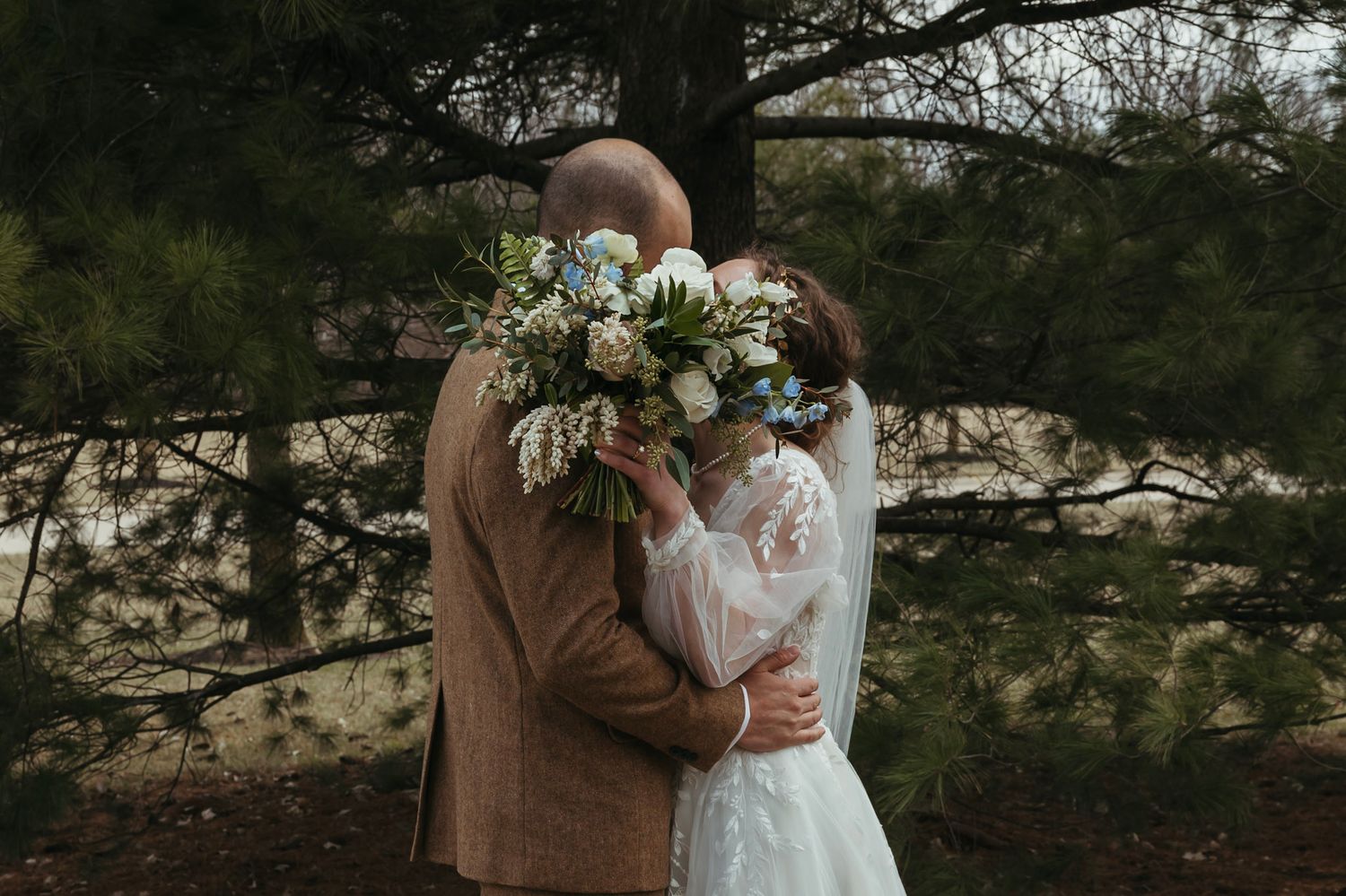 Romantic wedding portraits of a couple in Indiana in March, captured in a candid, timeless style.